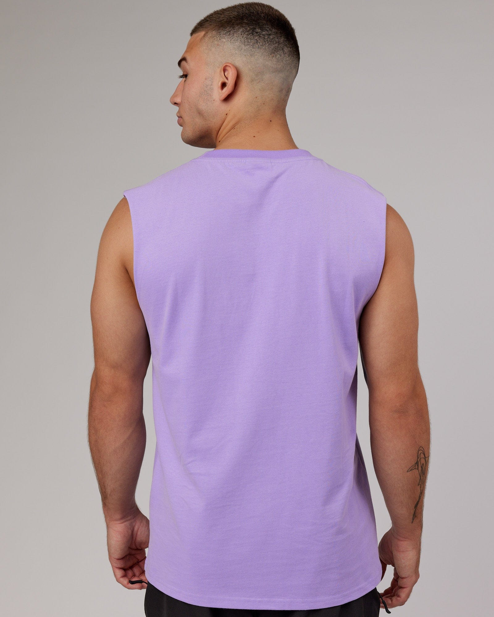 Model wearing Free Throw Heavyweight Tank Oversize - Peak Purple