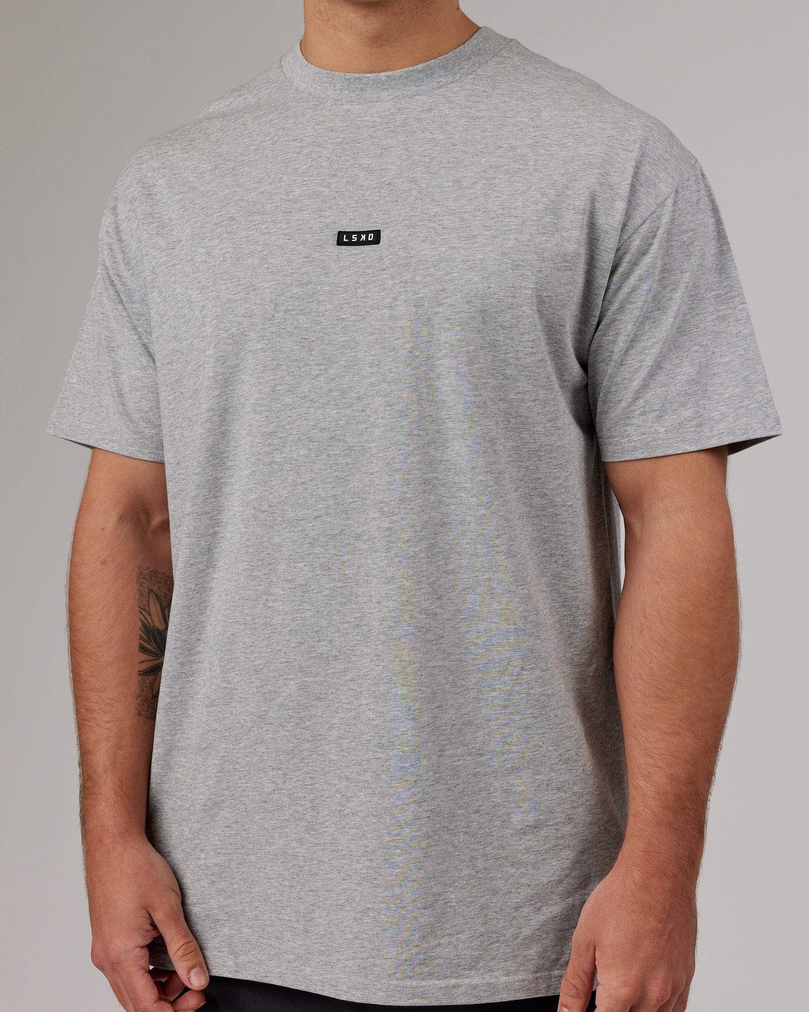 Model wearing Fundamental FLXCotton Tee Longline Oversize - Light Grey Marl