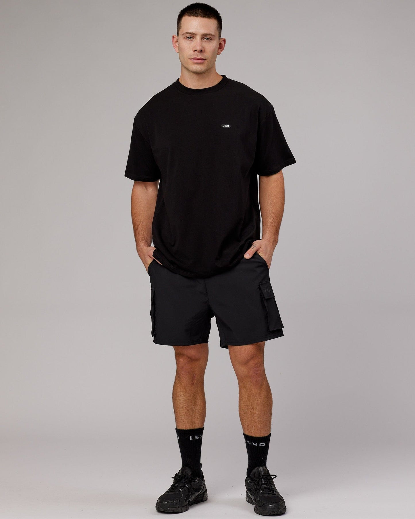 Model wearing Capsule FLXCotton Tee Oversize - Black