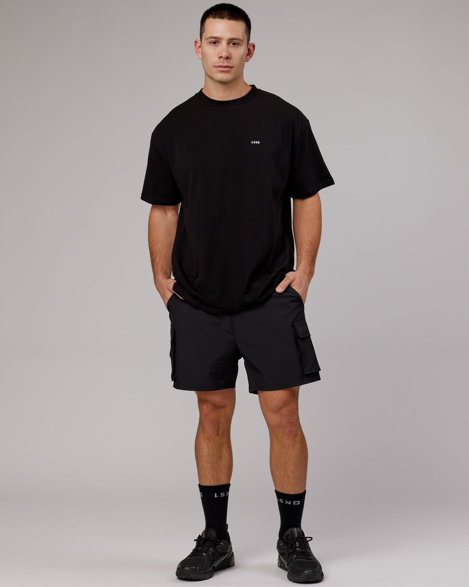 Model wearing Capsule FLXCotton Tee Oversize - Black