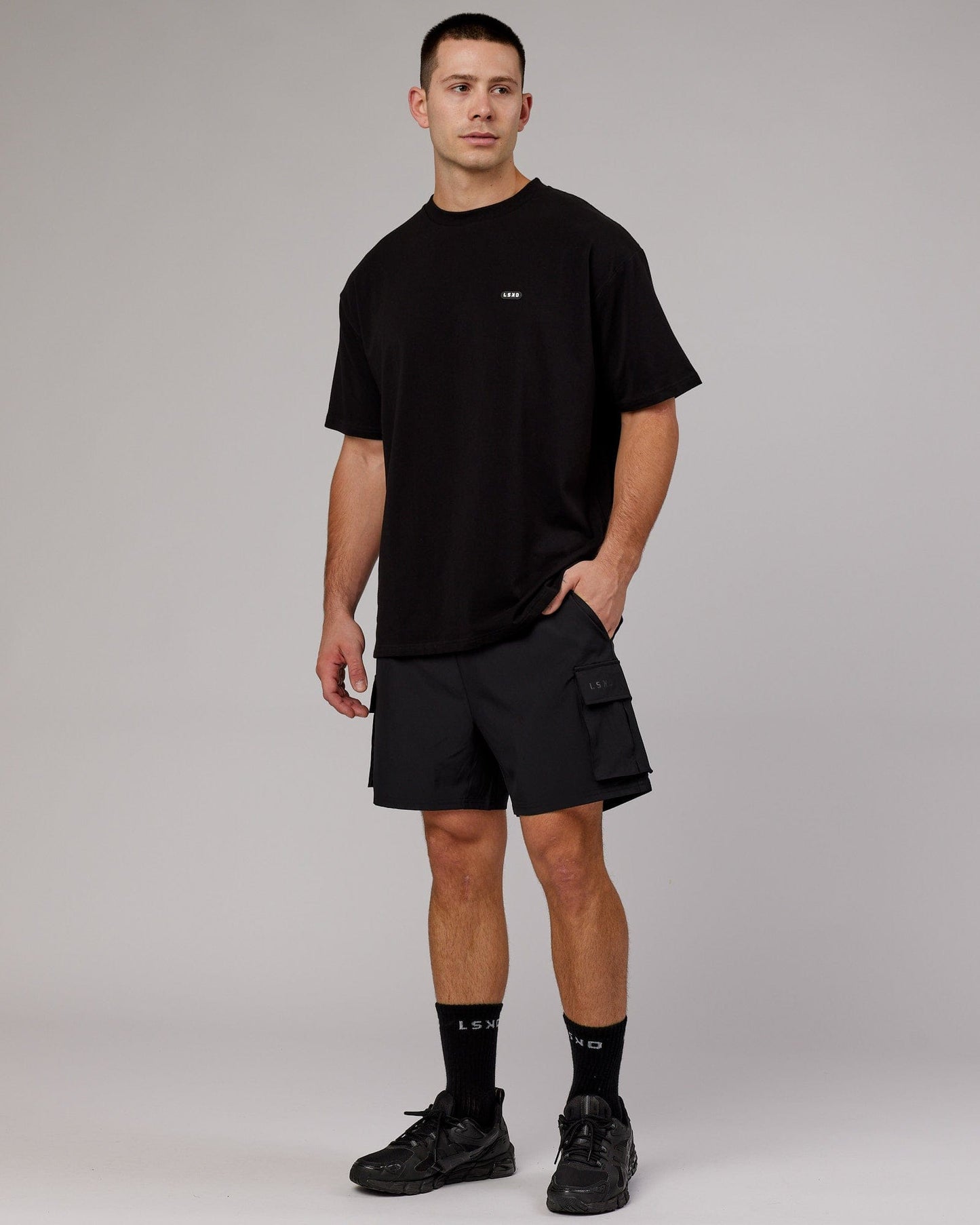 Model wearing Capsule FLXCotton Tee Oversize - Black