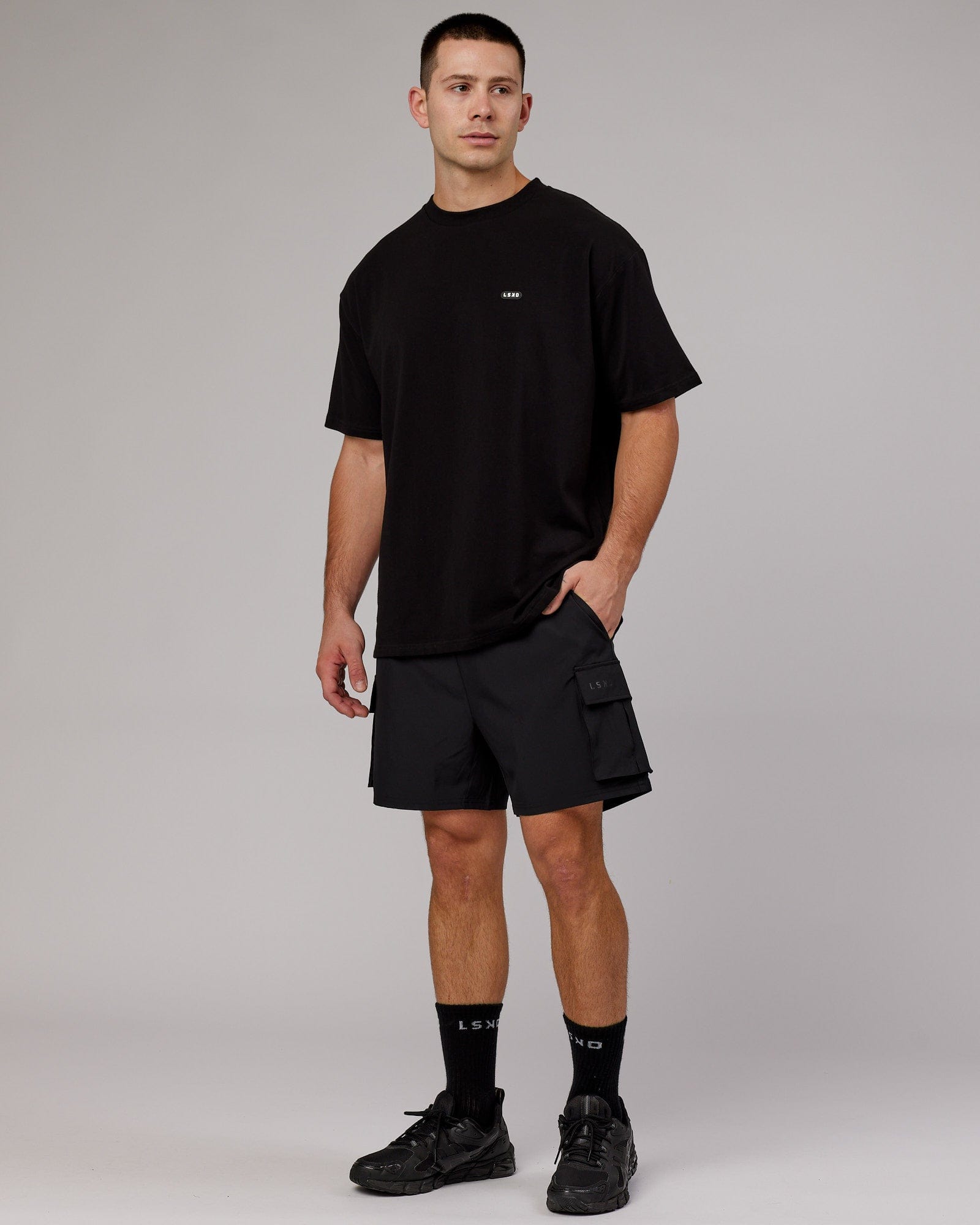 Model wearing Capsule FLXCotton Tee Oversize - Black