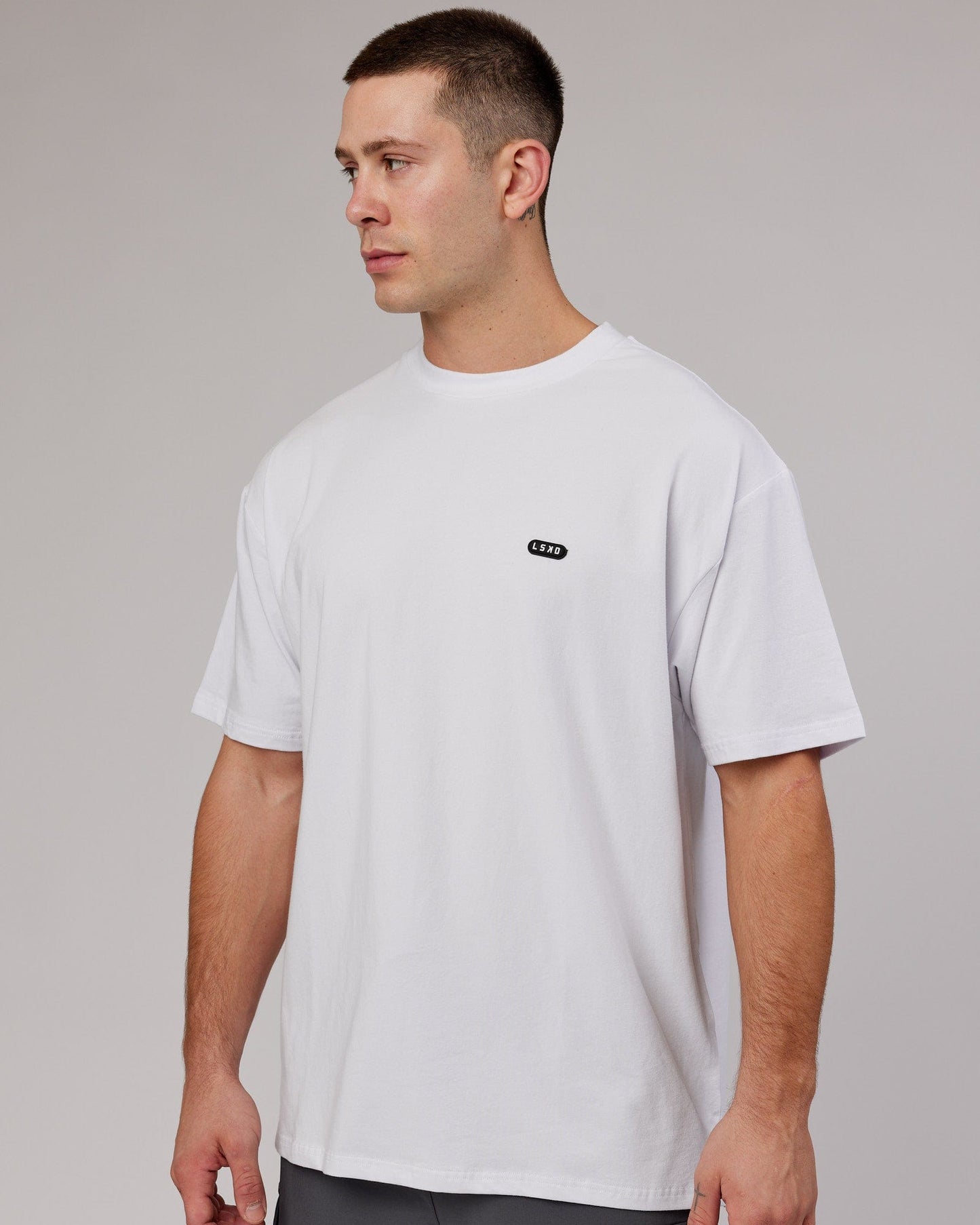 Model wearing Capsule FLXCotton Tee Oversize - White