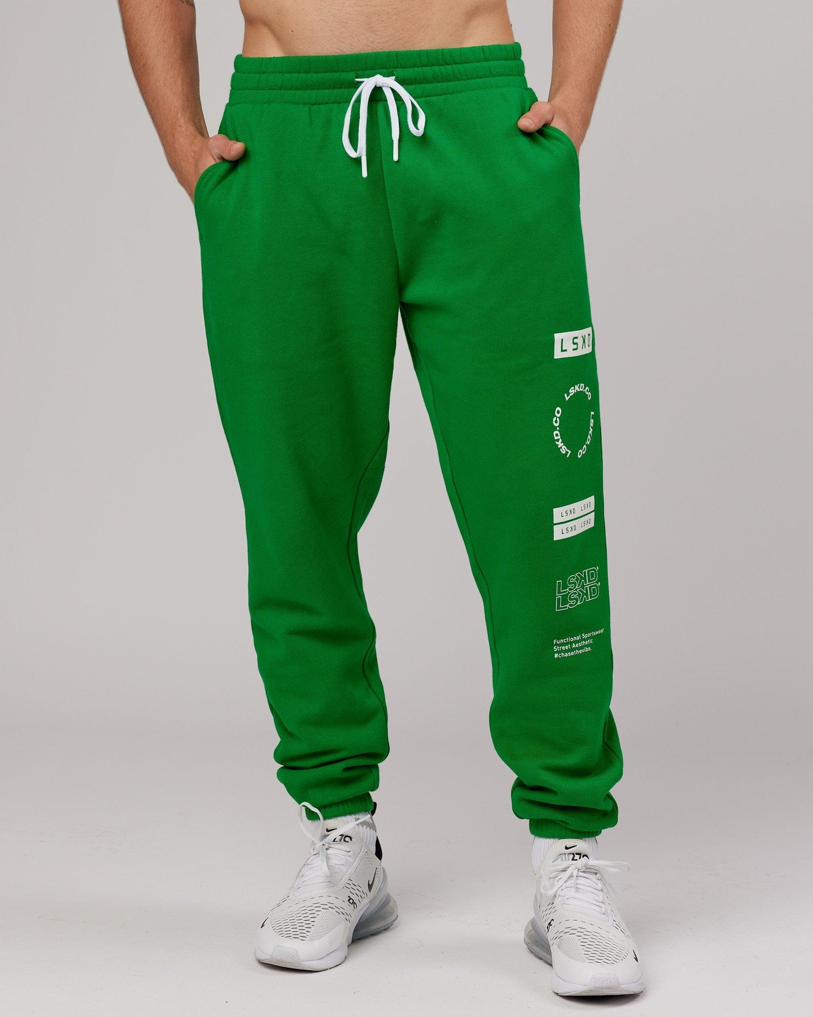 Model wearing Combo Track Pant - Vivid Green