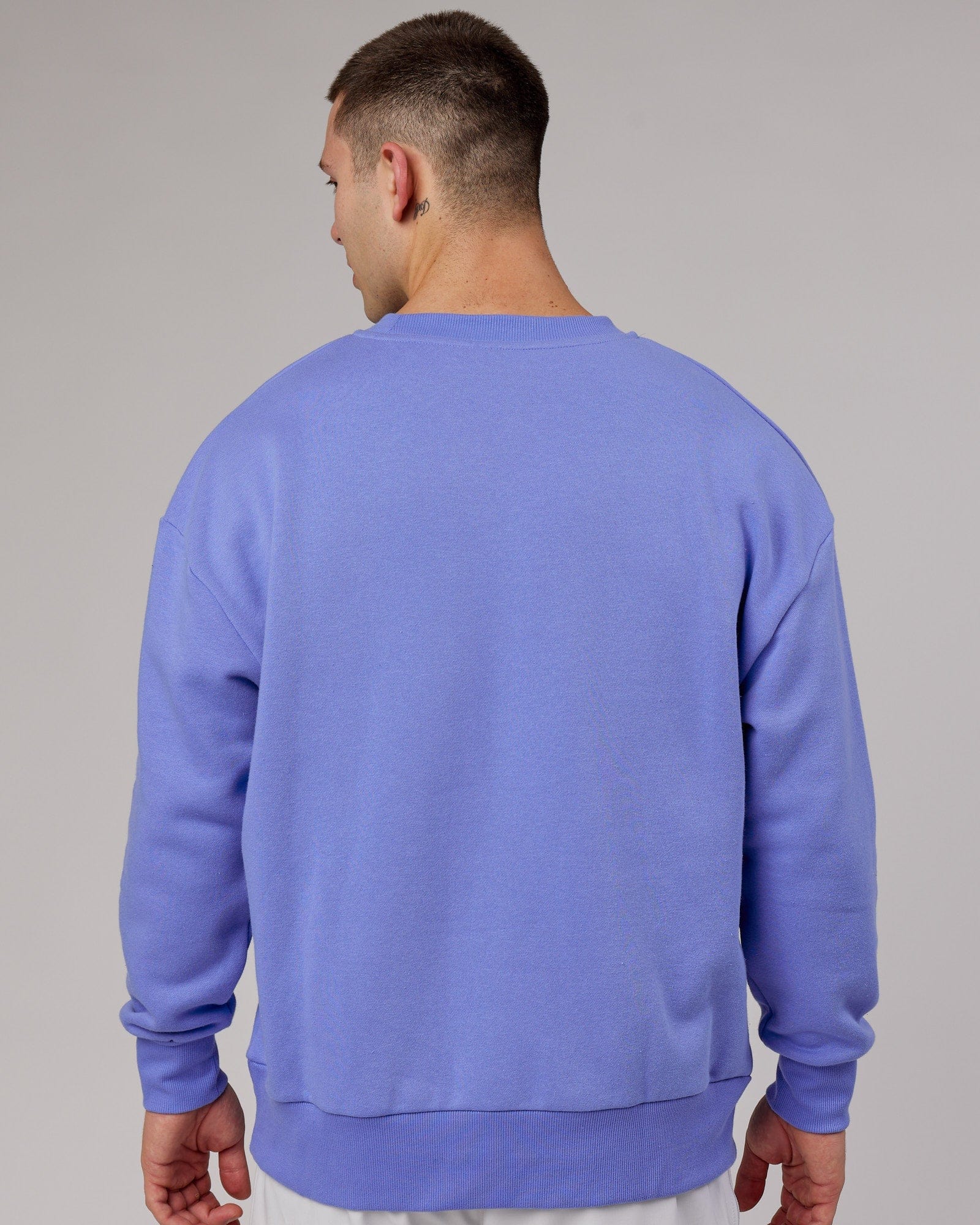 Model wearing Cornerstone Sweater Oversize - Cornflower Blue