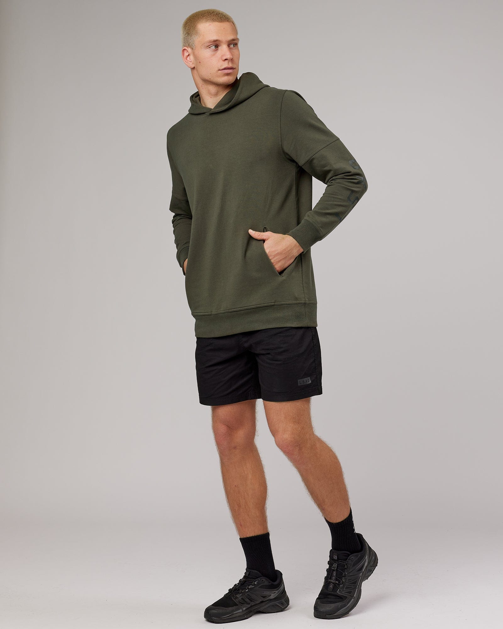 Model wearing Direction FLXFleece Hoodie - Forest Night