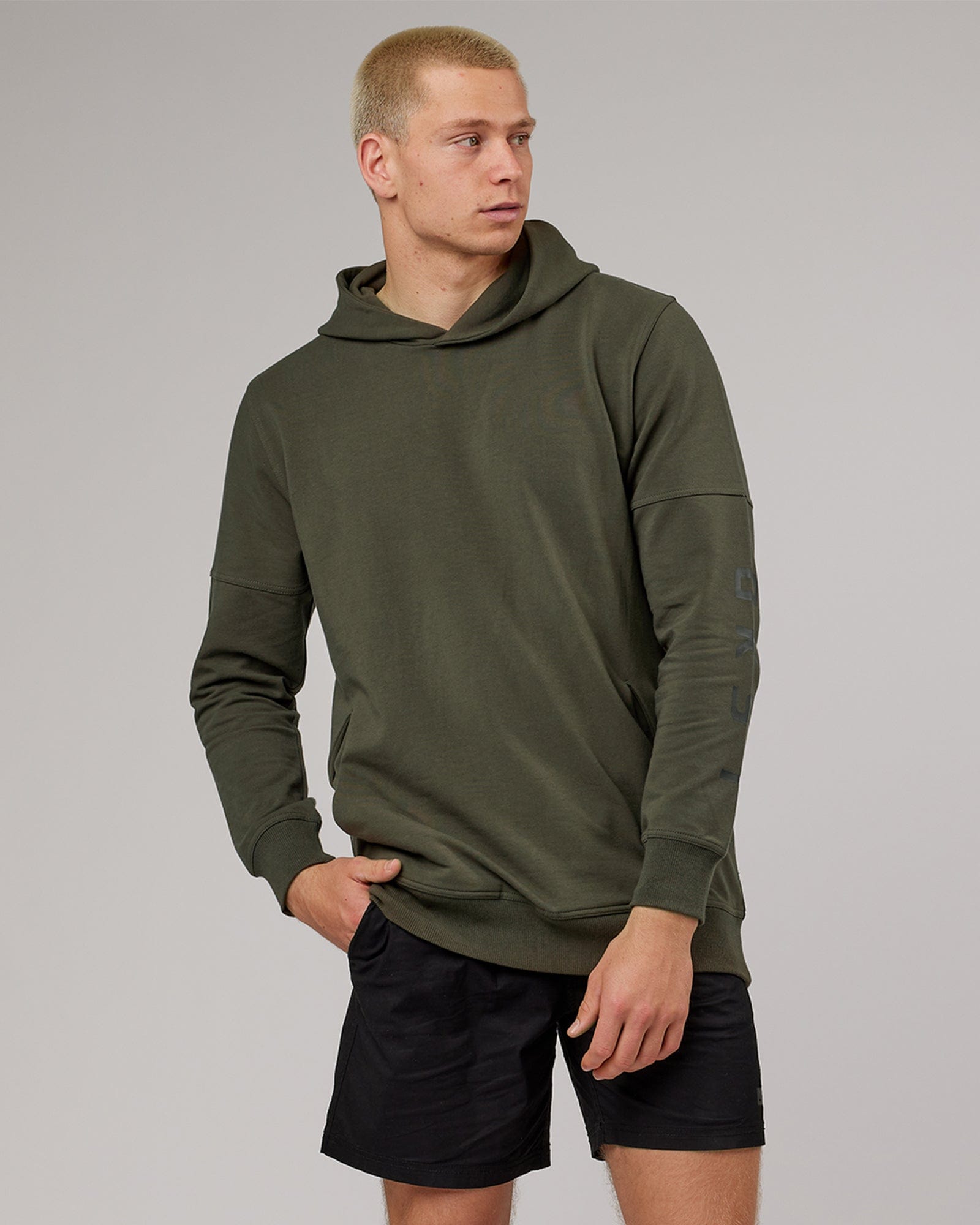 Model wearing Direction FLXFleece Hoodie - Forest Night