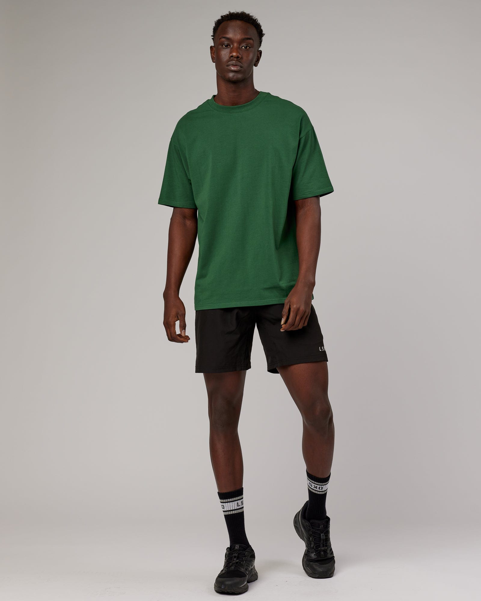 Model wearing DownLow FLXCotton Oversize Tee - Pineneedle