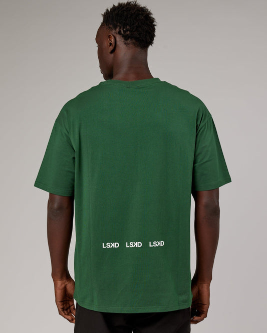 Model wearing DownLow FLXCotton Oversize Tee - Pineneedle