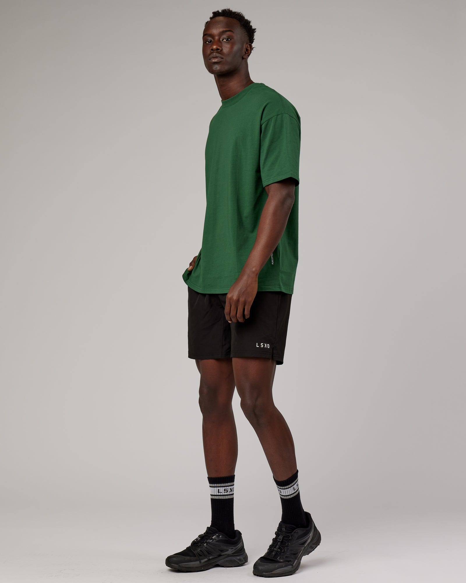 Model wearing DownLow FLXCotton Oversize Tee - Pineneedle