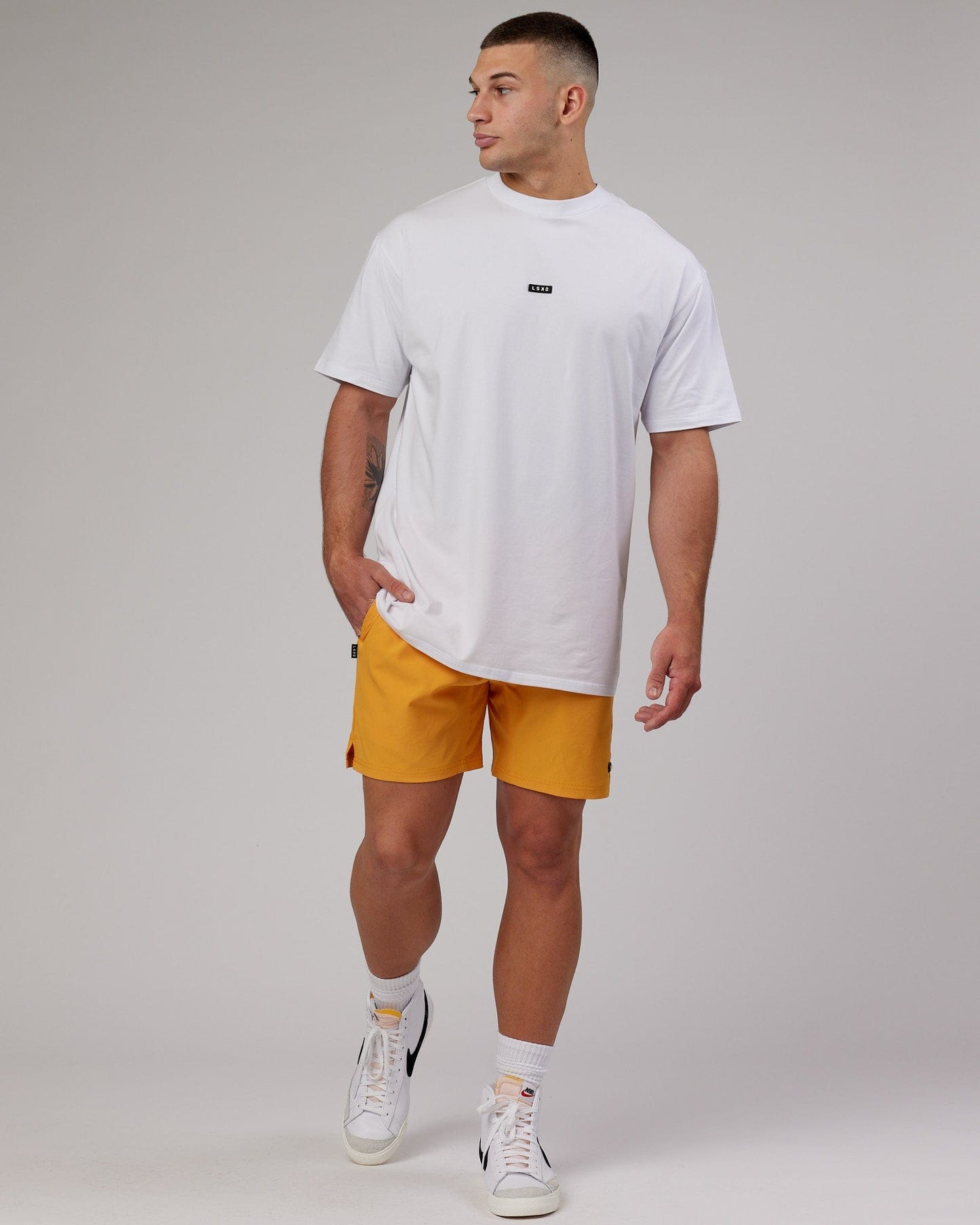 Model wearing Fundamental FLXCotton Tee Longline Oversize - White