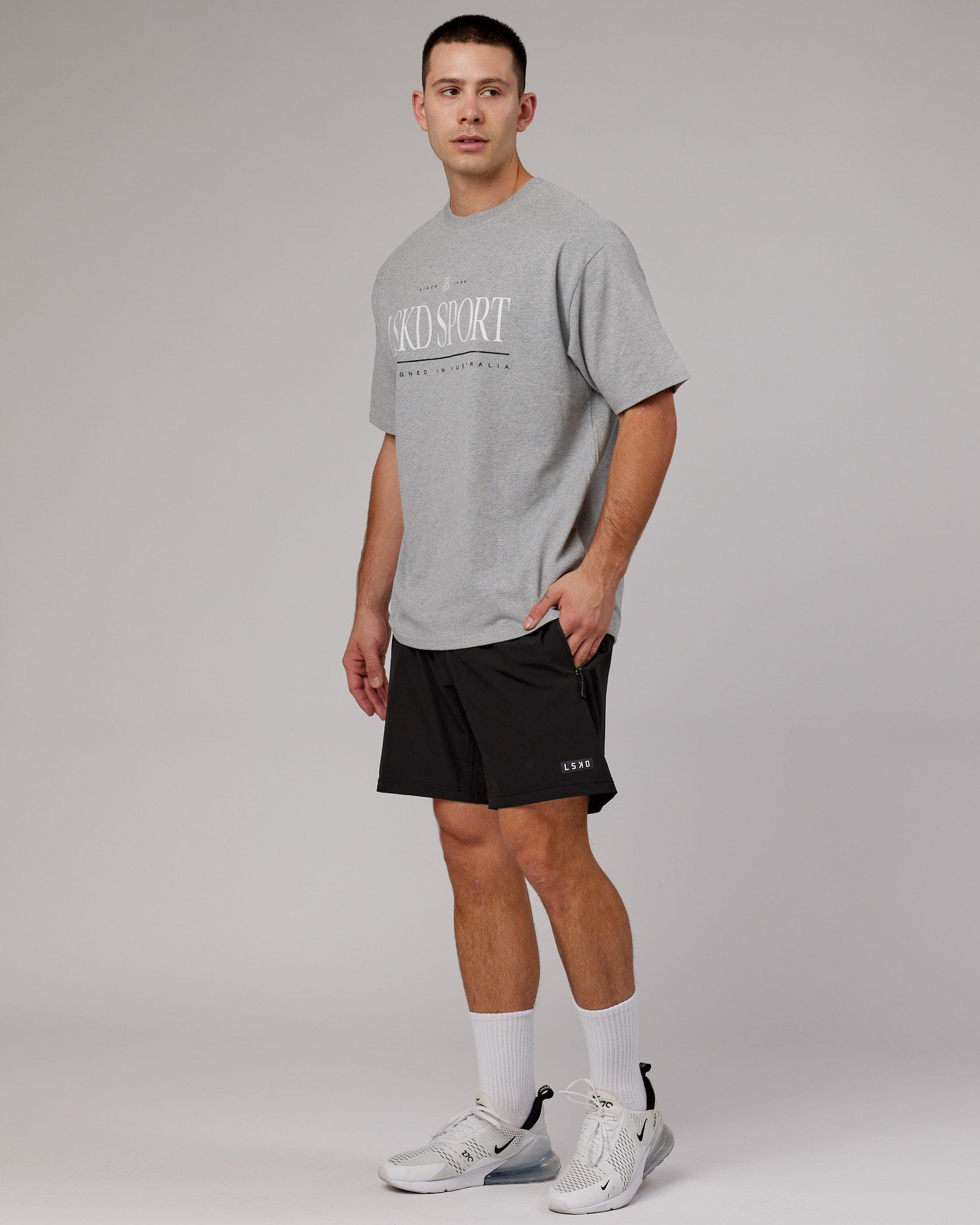 Model wearing Heritage Heavyweight Tee Oversize - Lt Grey Marl