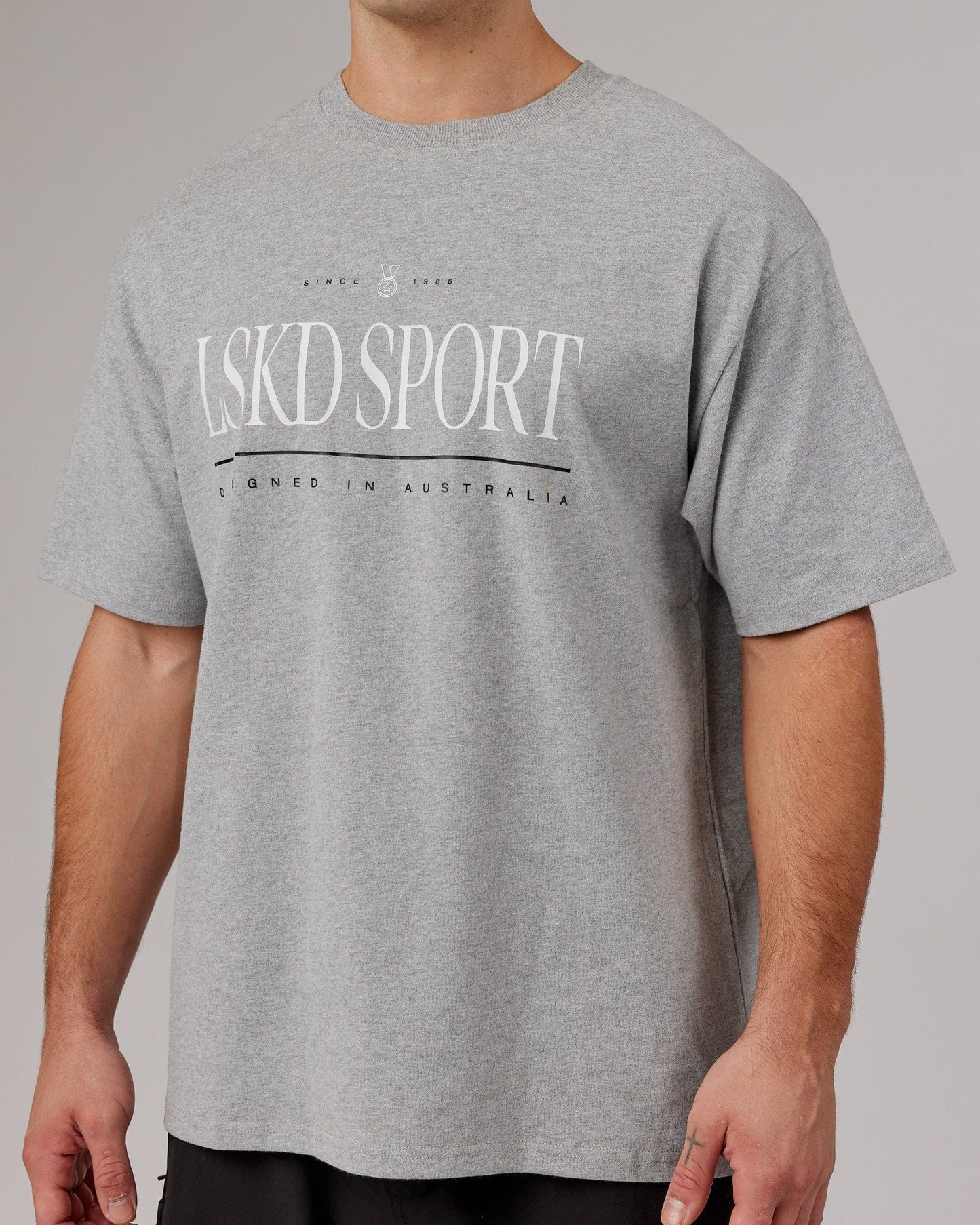 Model wearing Heritage Heavyweight Tee Oversize - Lt Grey Marl