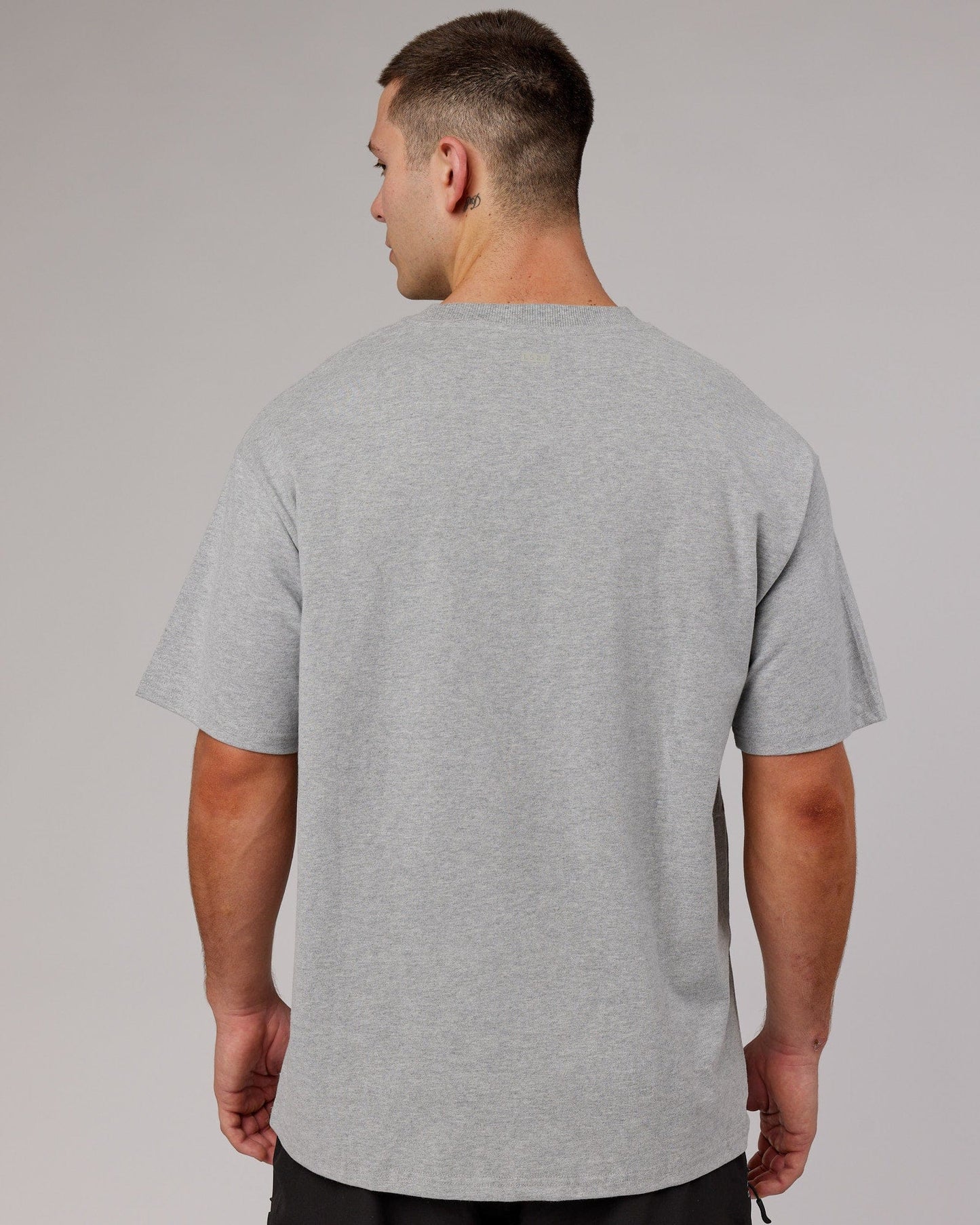 Model wearing Heritage Heavyweight Tee Oversize - Lt Grey Marl
