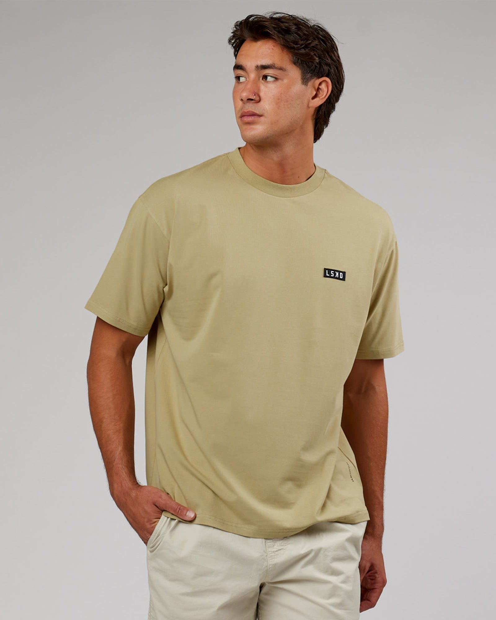 Model wearing Iconic FLXCotton Tee Oversize - Reed