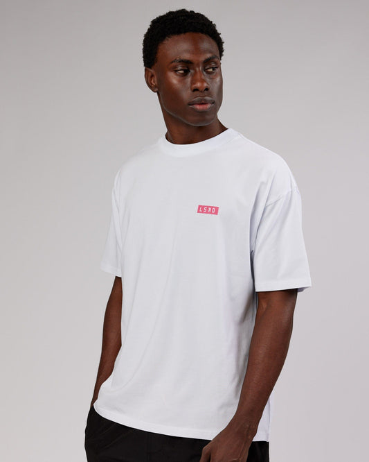 Model wearing Iconic FLXCotton Tee Oversize - White-Pink