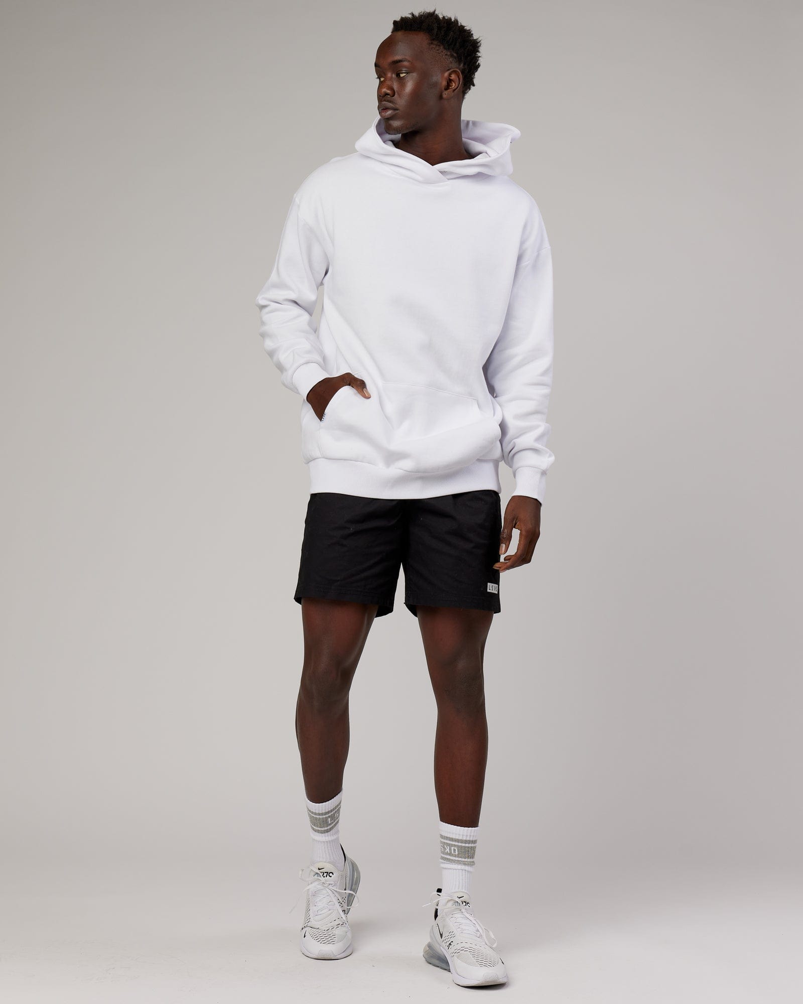 Model wearing Linear Hoodie Oversize - White