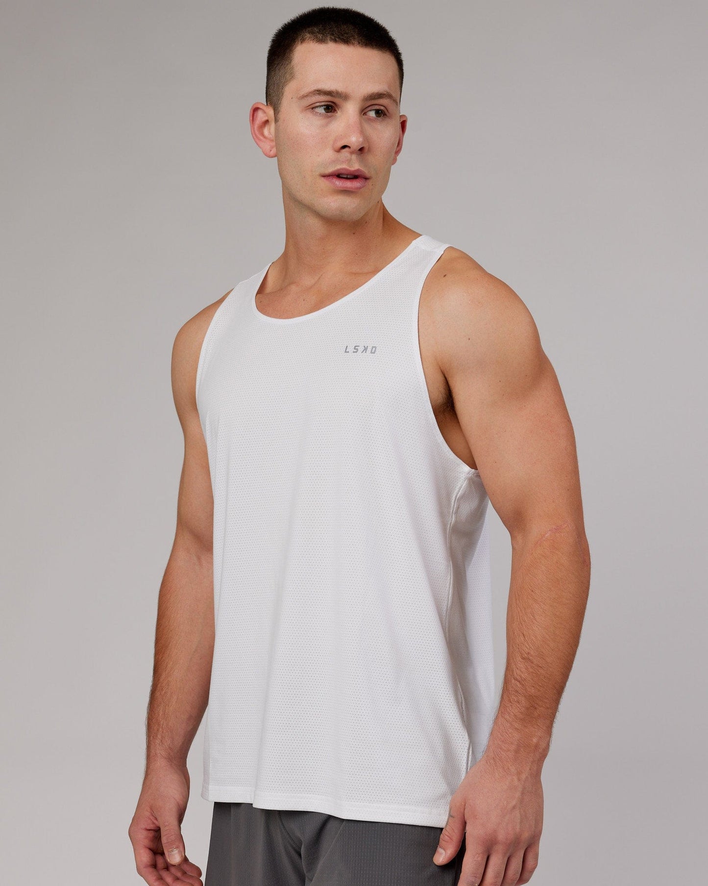 Model wearing Perform VapourFLX Tank - White Marl