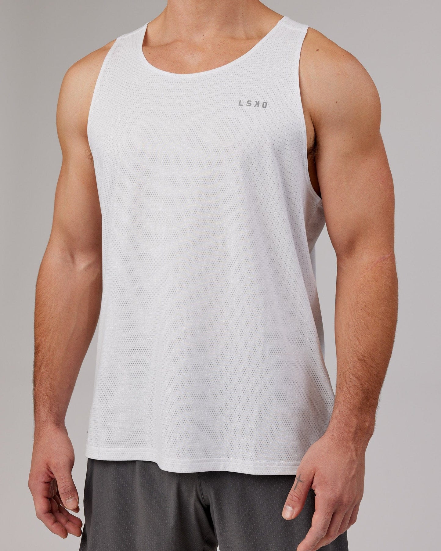 Model wearing Perform VapourFLX Tank - White Marl