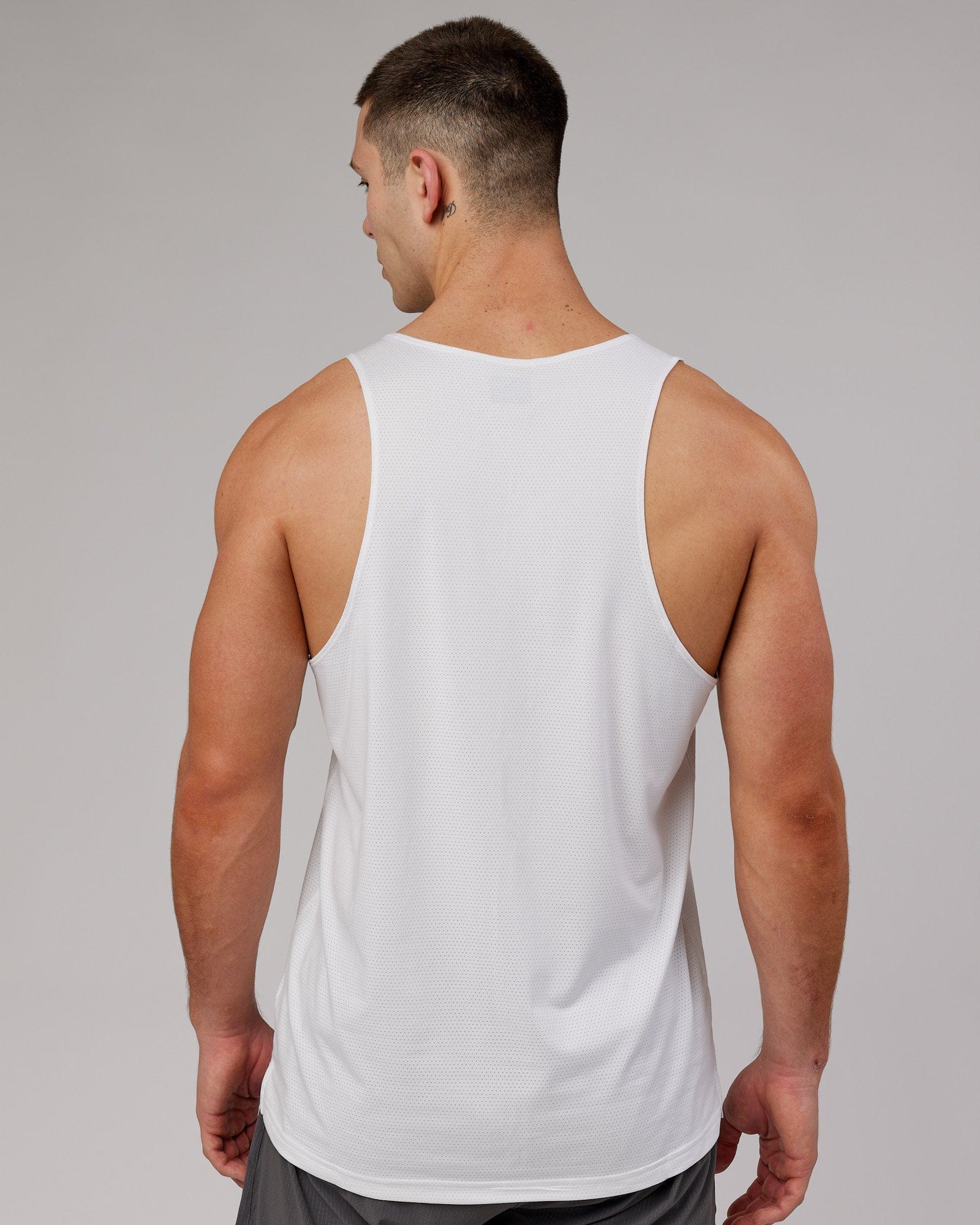 Model wearing Perform VapourFLX Tank - White Marl