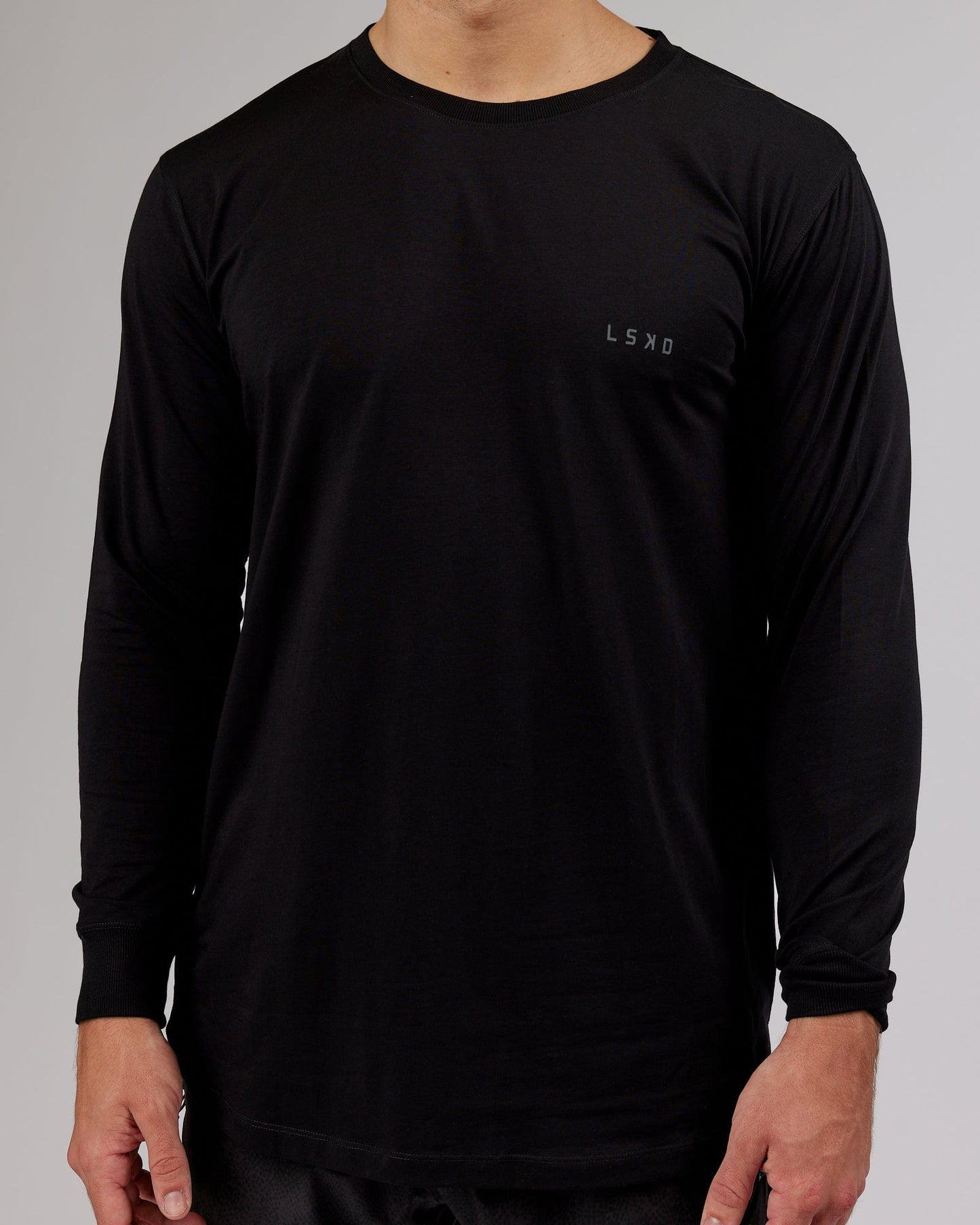 Model wearing Deluxe PimaFLX LS Tee - Black