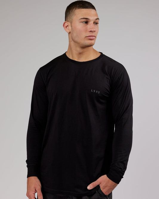 Model wearing Deluxe PimaFLX LS Tee - Black