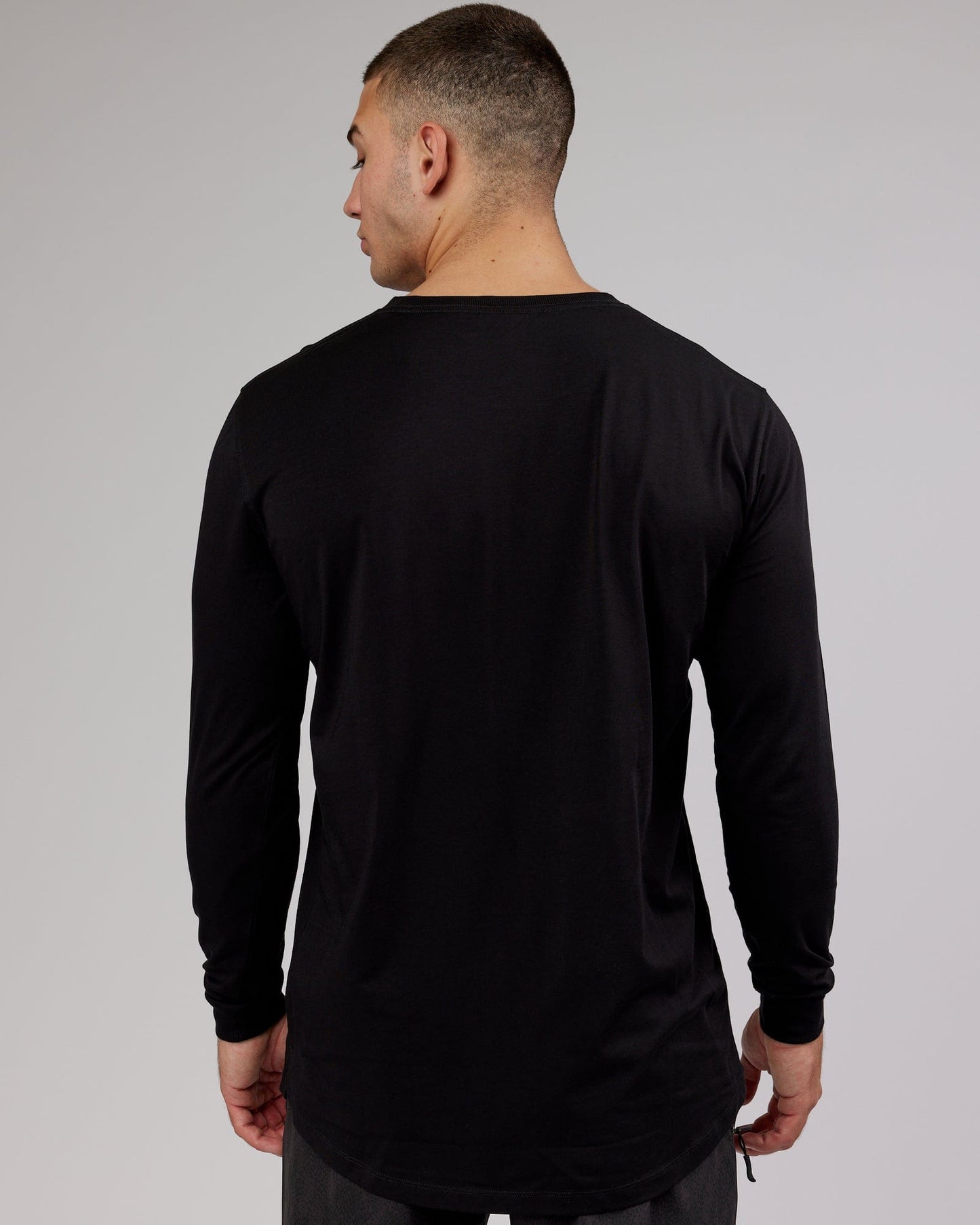 Model wearing Deluxe PimaFLX LS Tee - Black