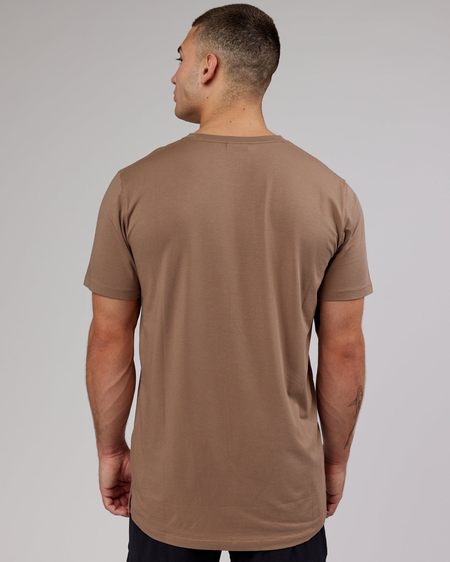 Model wearing Deluxe PimaFLX Tee - Fossil