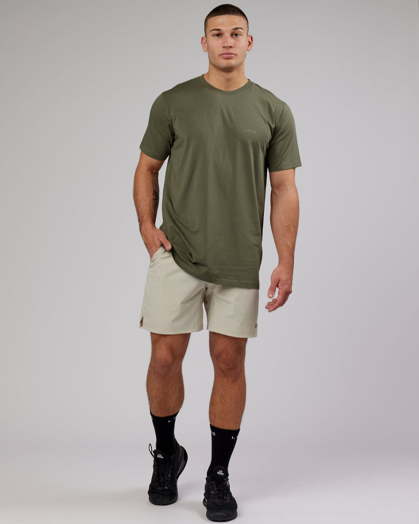 Model wearing Deluxe PimaFLX Tee - Olive Fade