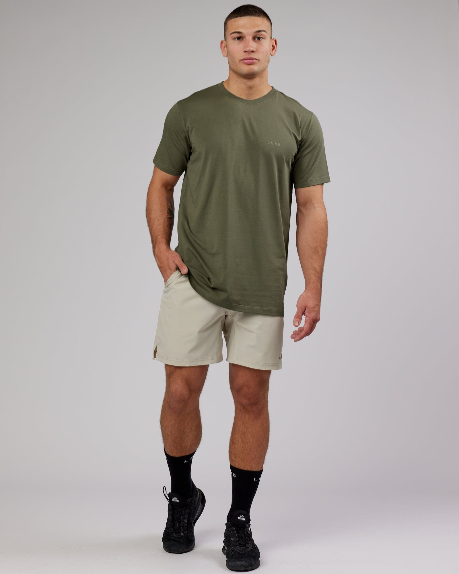 Model wearing Deluxe PimaFLX Tee - Olive Fade