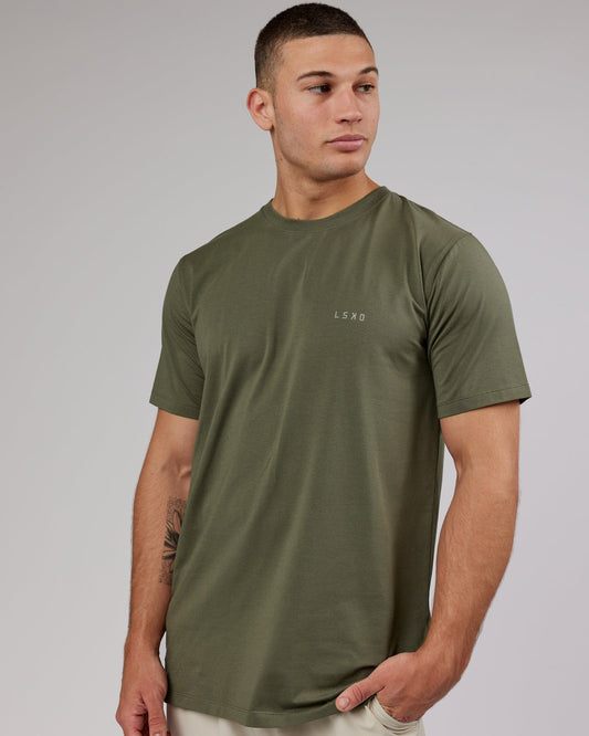 Model wearing Deluxe PimaFLX Tee - Olive Fade