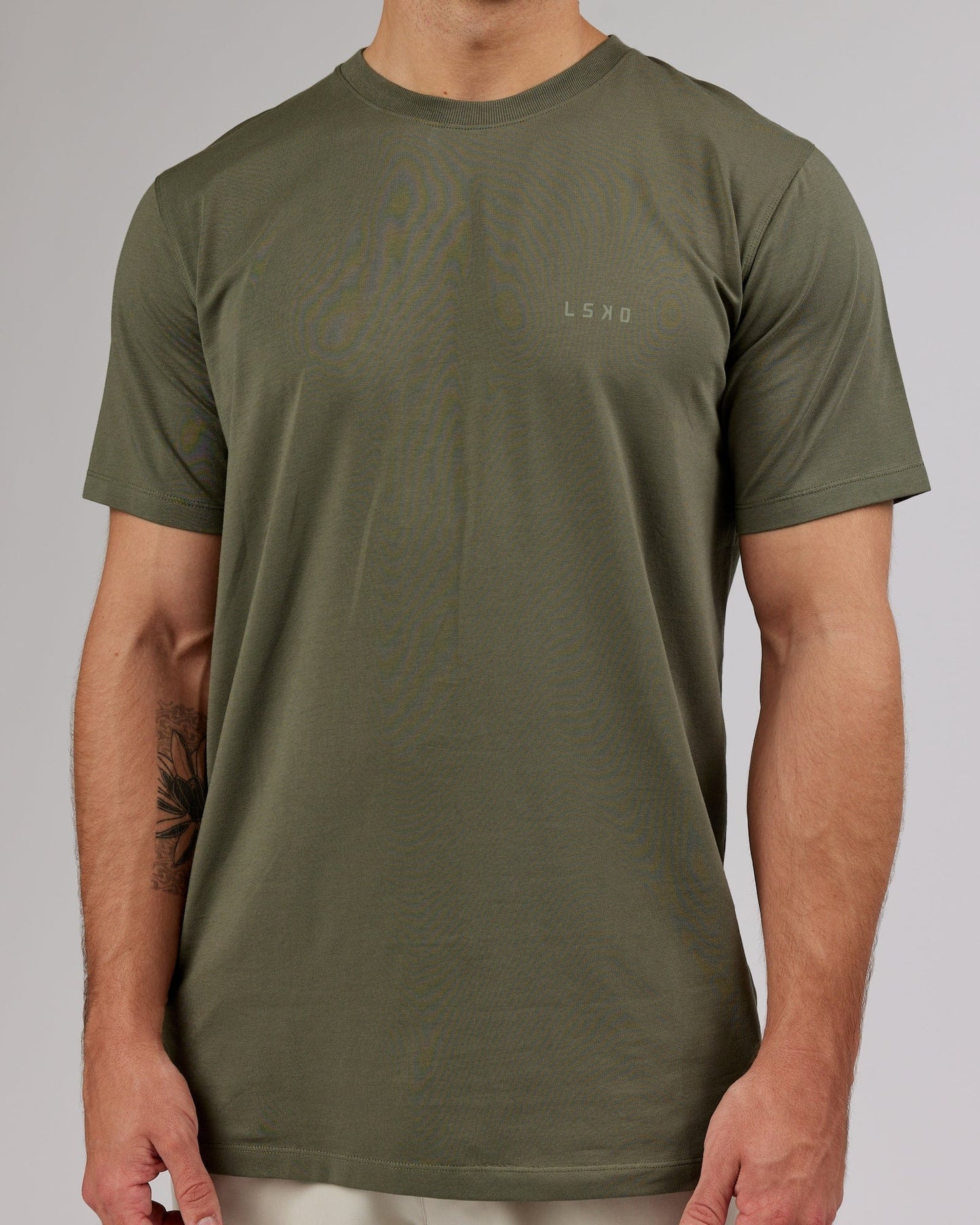 Model wearing Deluxe PimaFLX Tee - Olive Fade