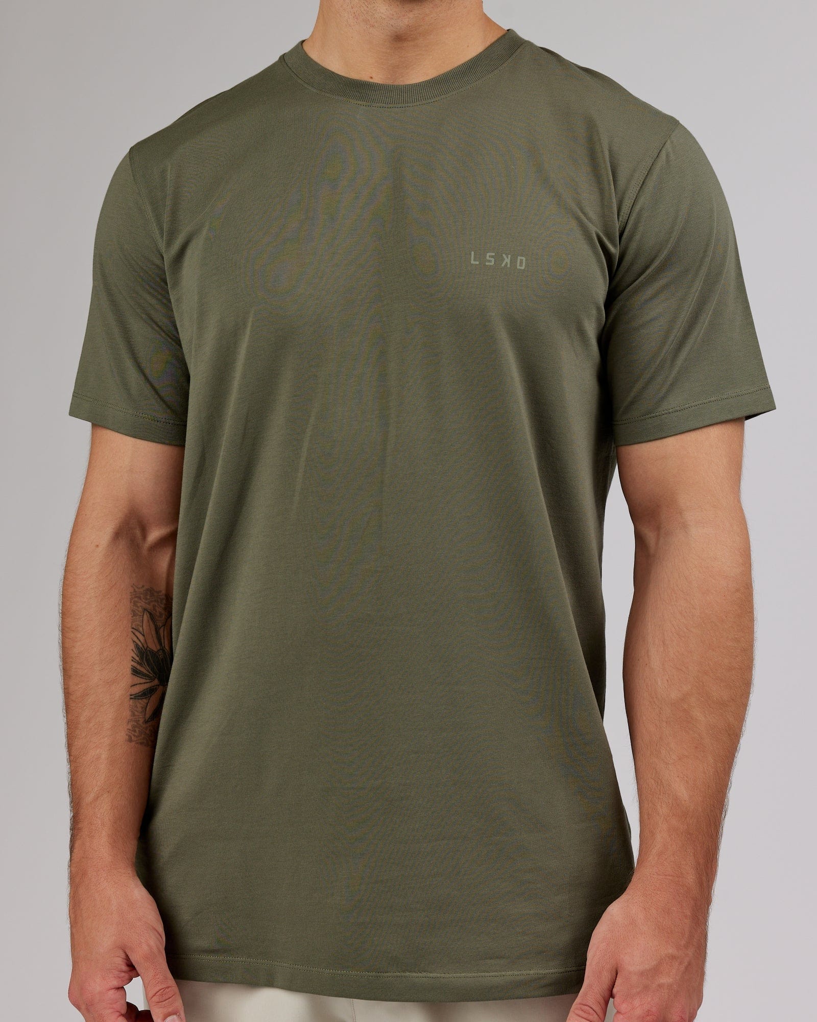 Model wearing Deluxe PimaFLX Tee - Olive Fade
