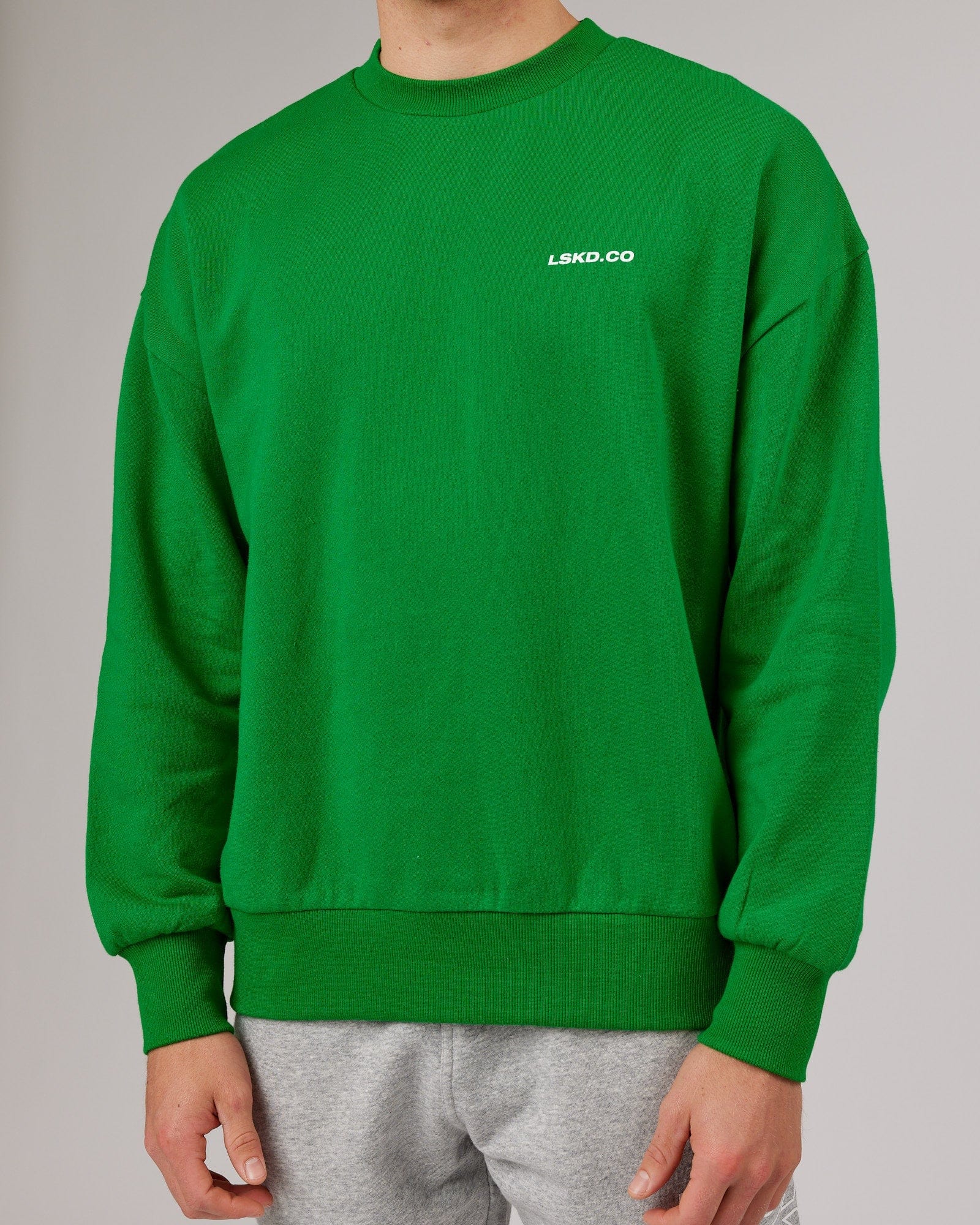 Model wearing Revolutions Oversize Sweater - Vivid Green