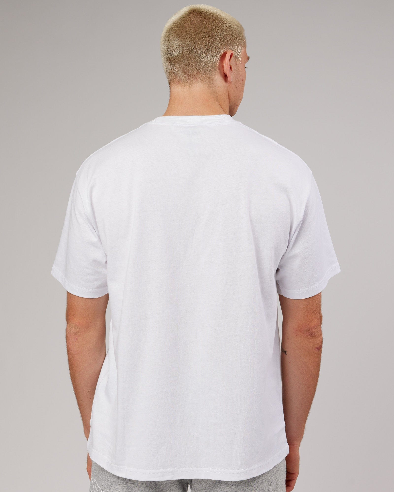 Model wearing Stacks Up Heavyweight Oversize Tee - White-Vivid Green