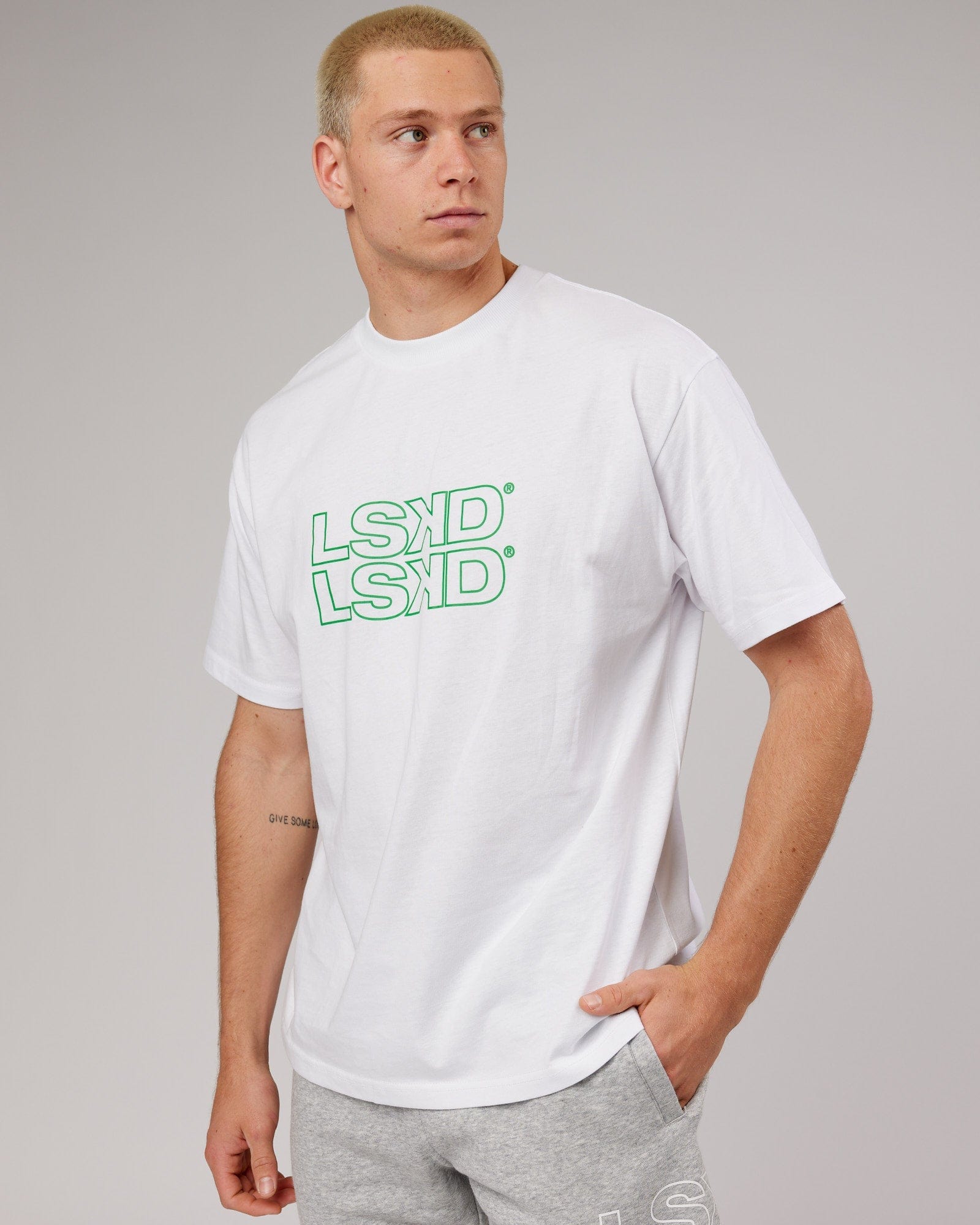 Model wearing Stacks Up Heavyweight Oversize Tee - White-Vivid Green