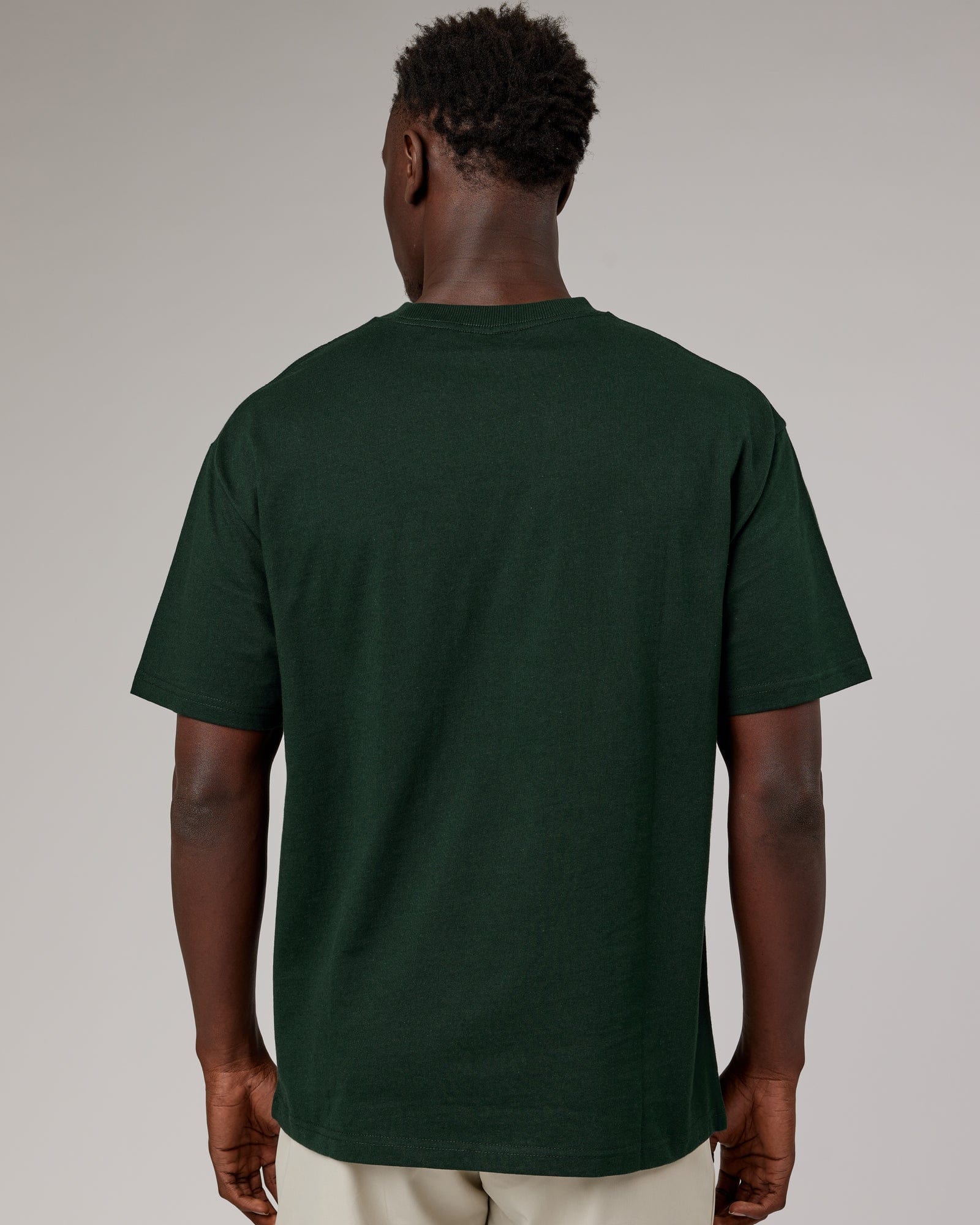 Model wearing Stacks Up Heavyweight Oversize Tee - Forest