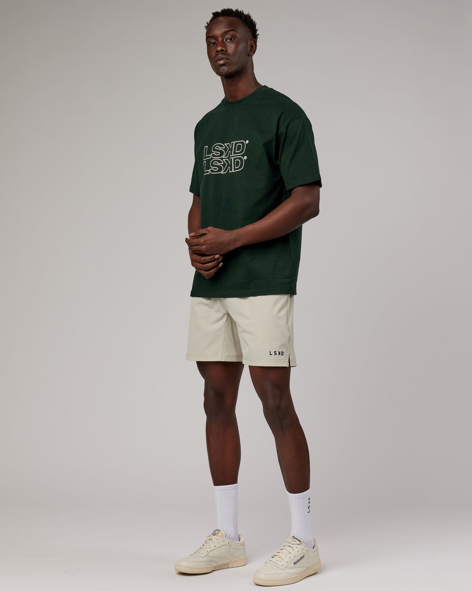 Model wearing Stacks Up Heavyweight Oversize Tee - Forest