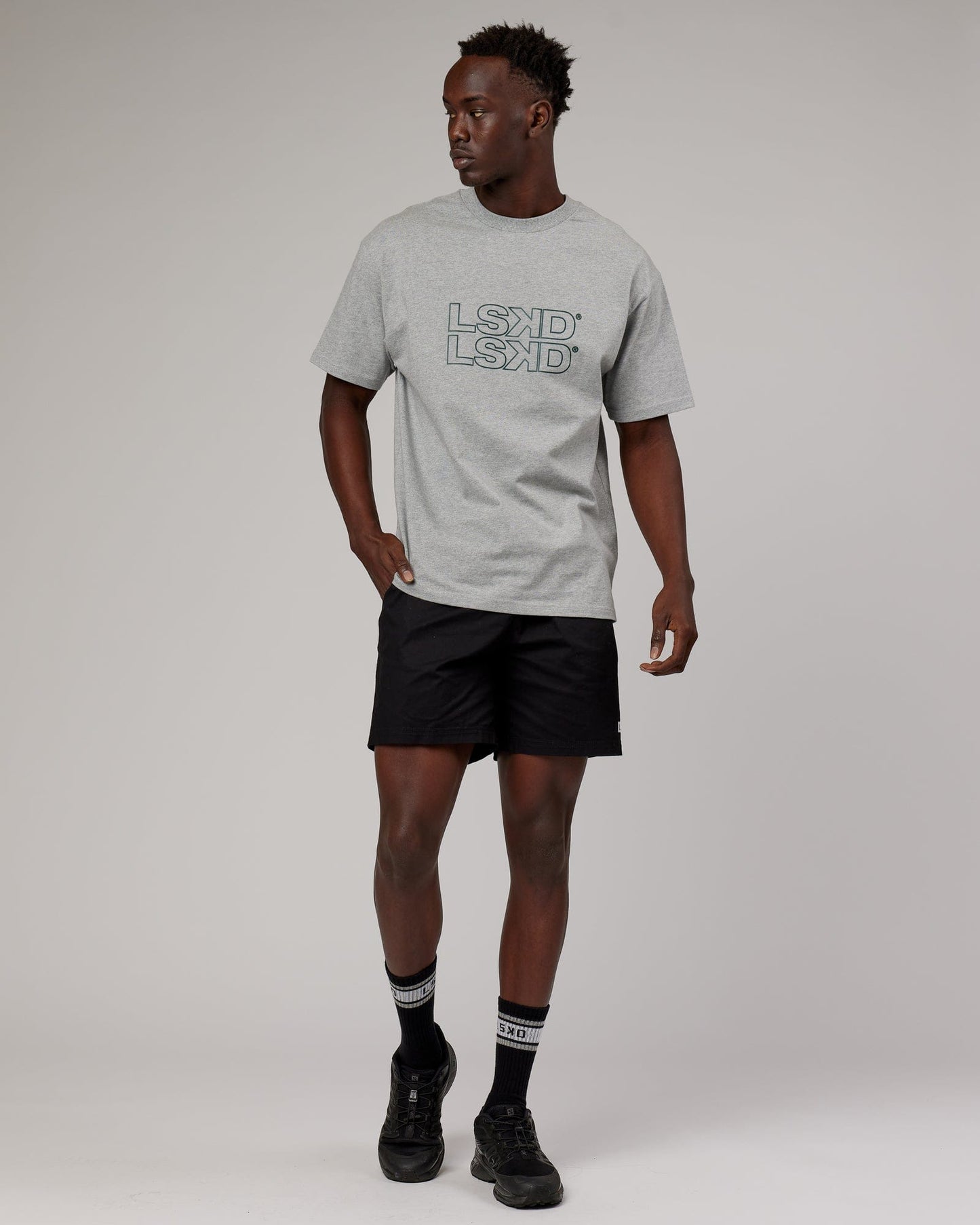 Model wearing Stacks Up Heavyweight Oversize Tee - Lt Grey Marl
