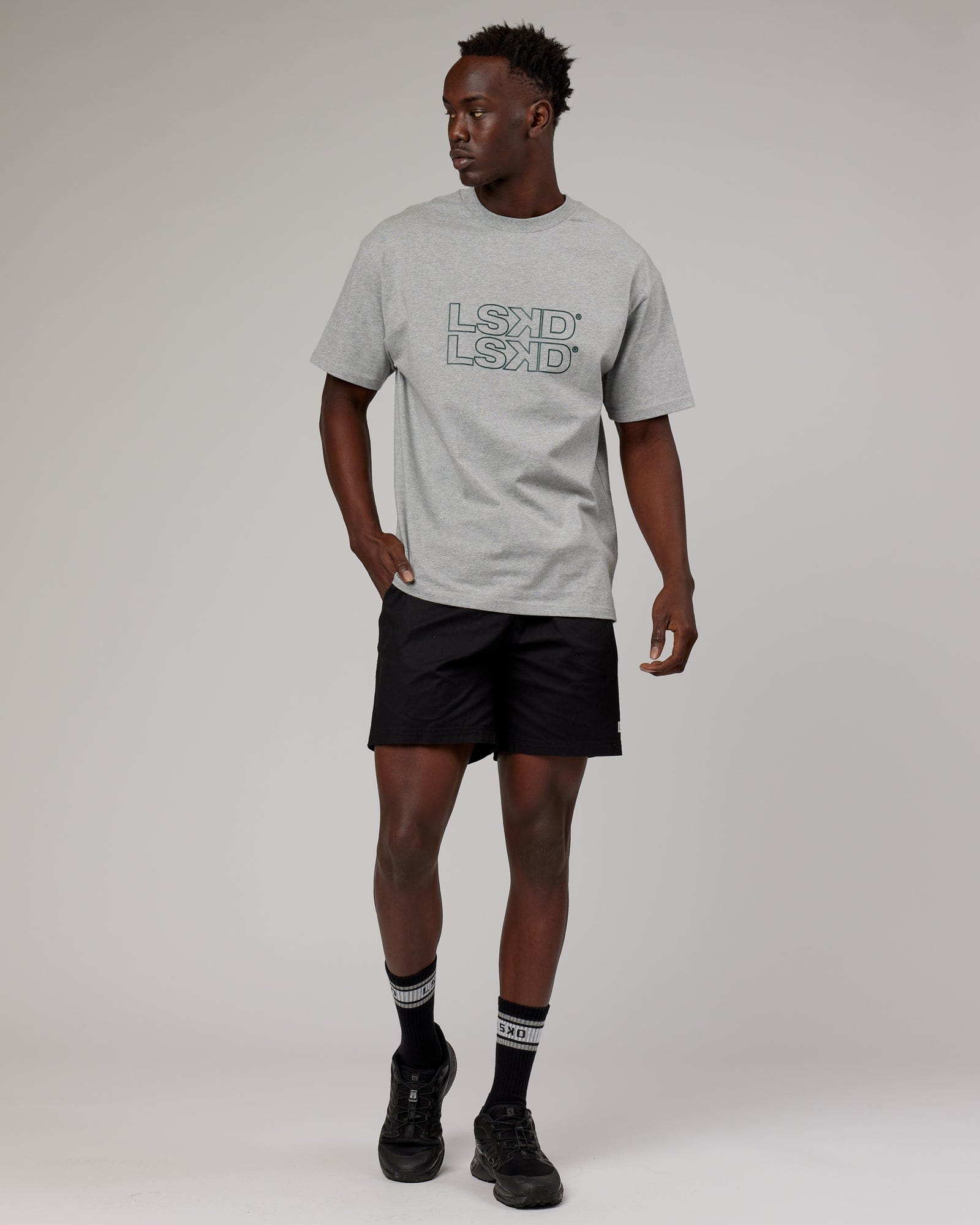 Model wearing Stacks Up Heavyweight Oversize Tee - Lt Grey Marl