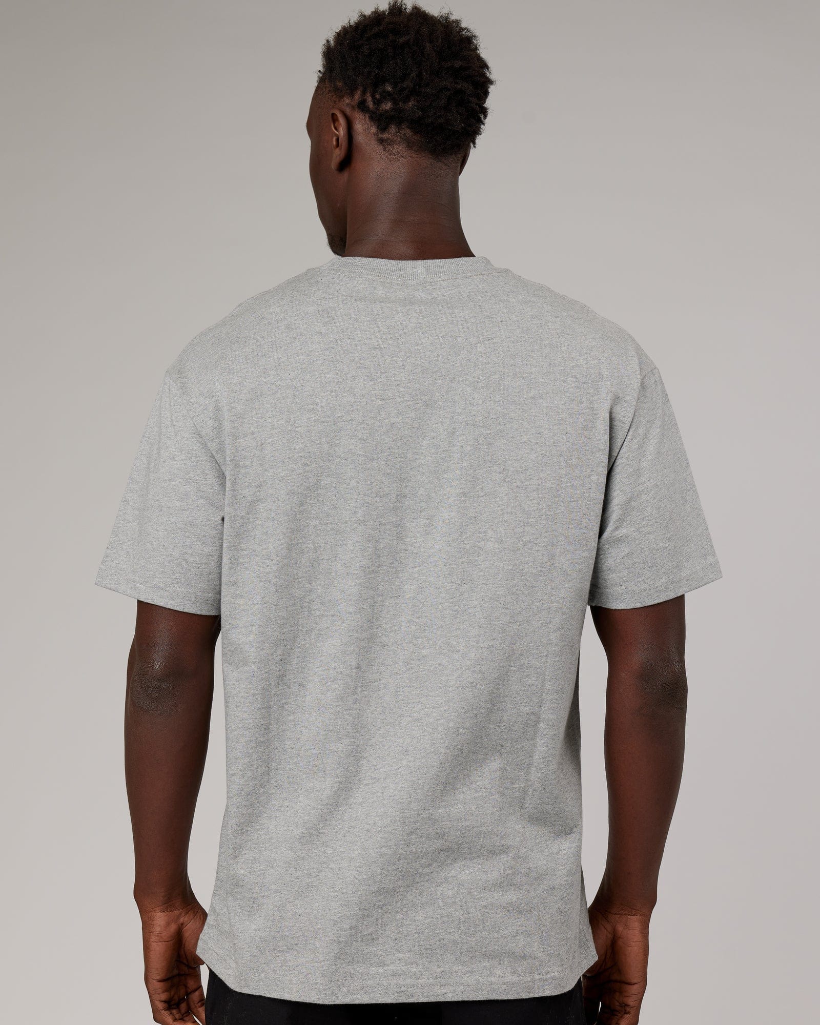 Model wearing Stacks Up Heavyweight Oversize Tee - Lt Grey Marl