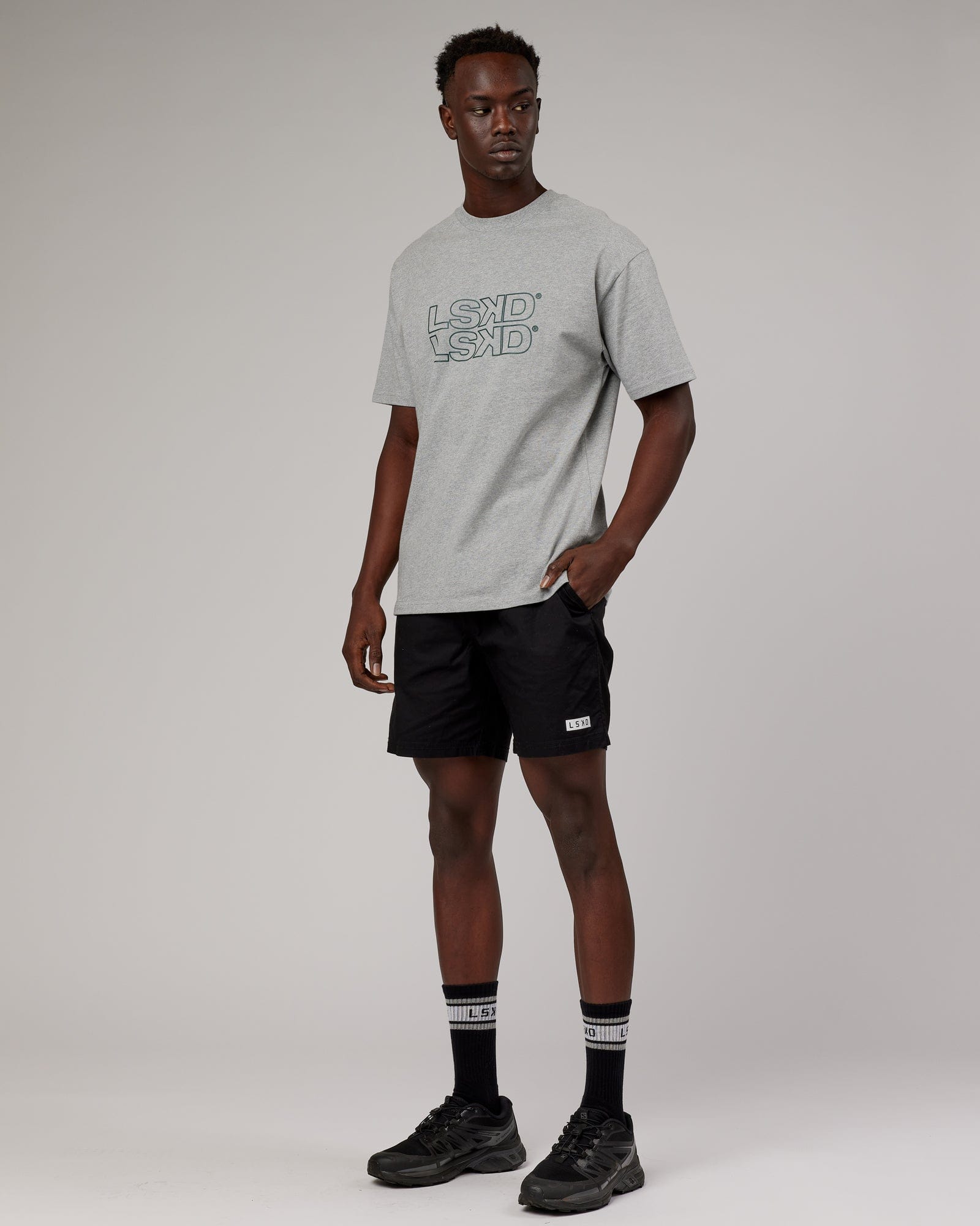 Model wearing Stacks Up Heavyweight Oversize Tee - Lt Grey Marl