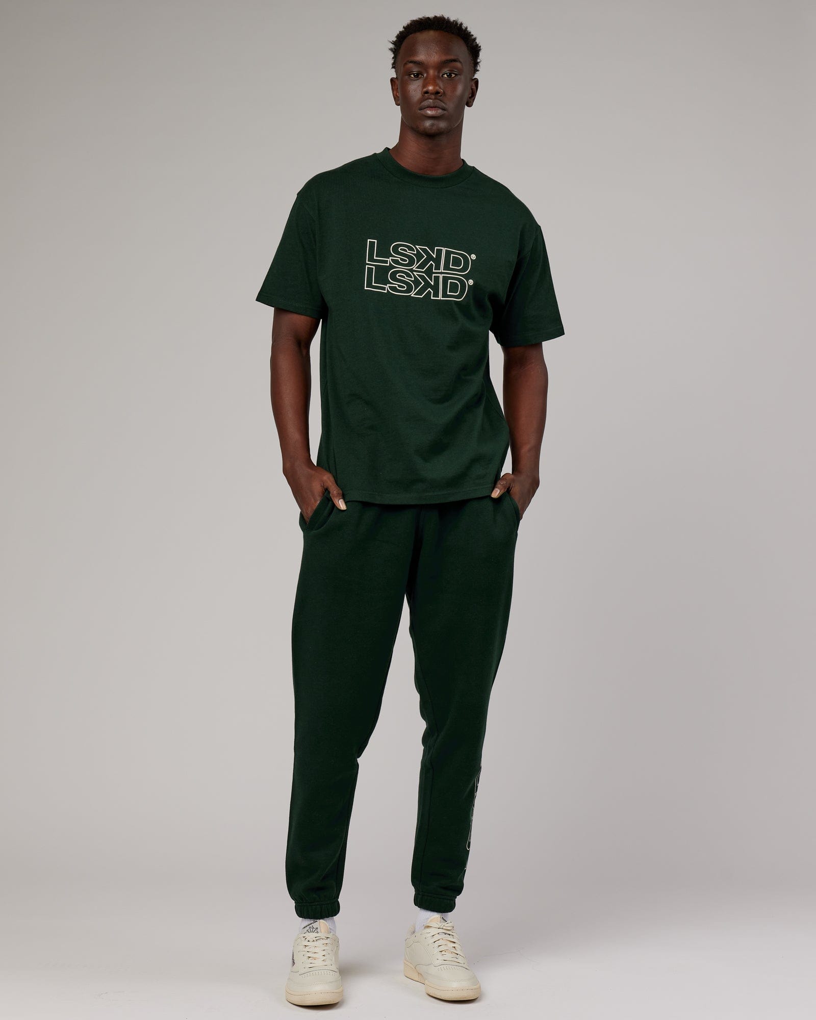Model wearing Stacks Up Track Pant - Forest