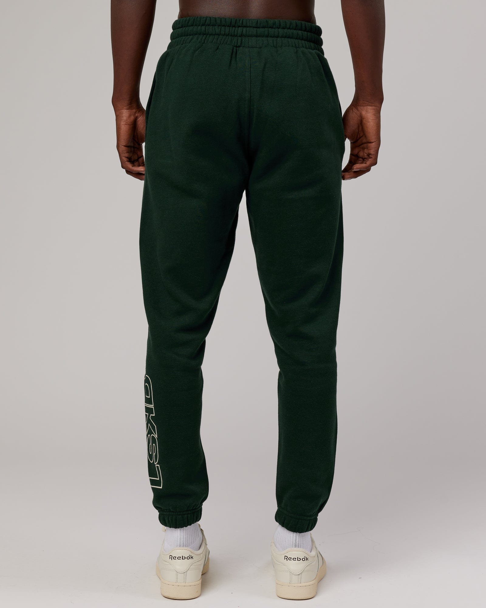 Model wearing Stacks Up Track Pant - Forest