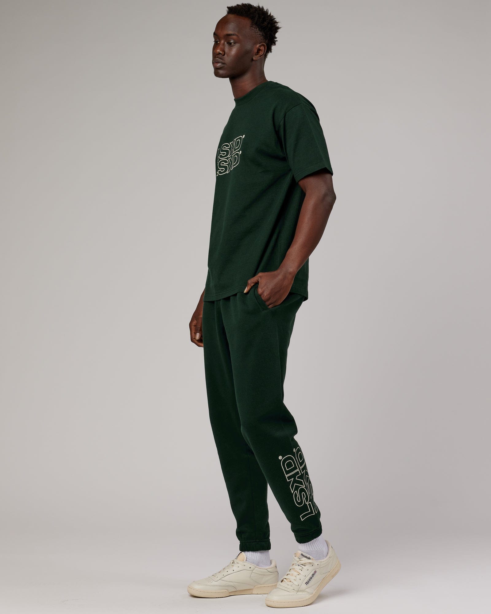 Model wearing Stacks Up Track Pant - Forest