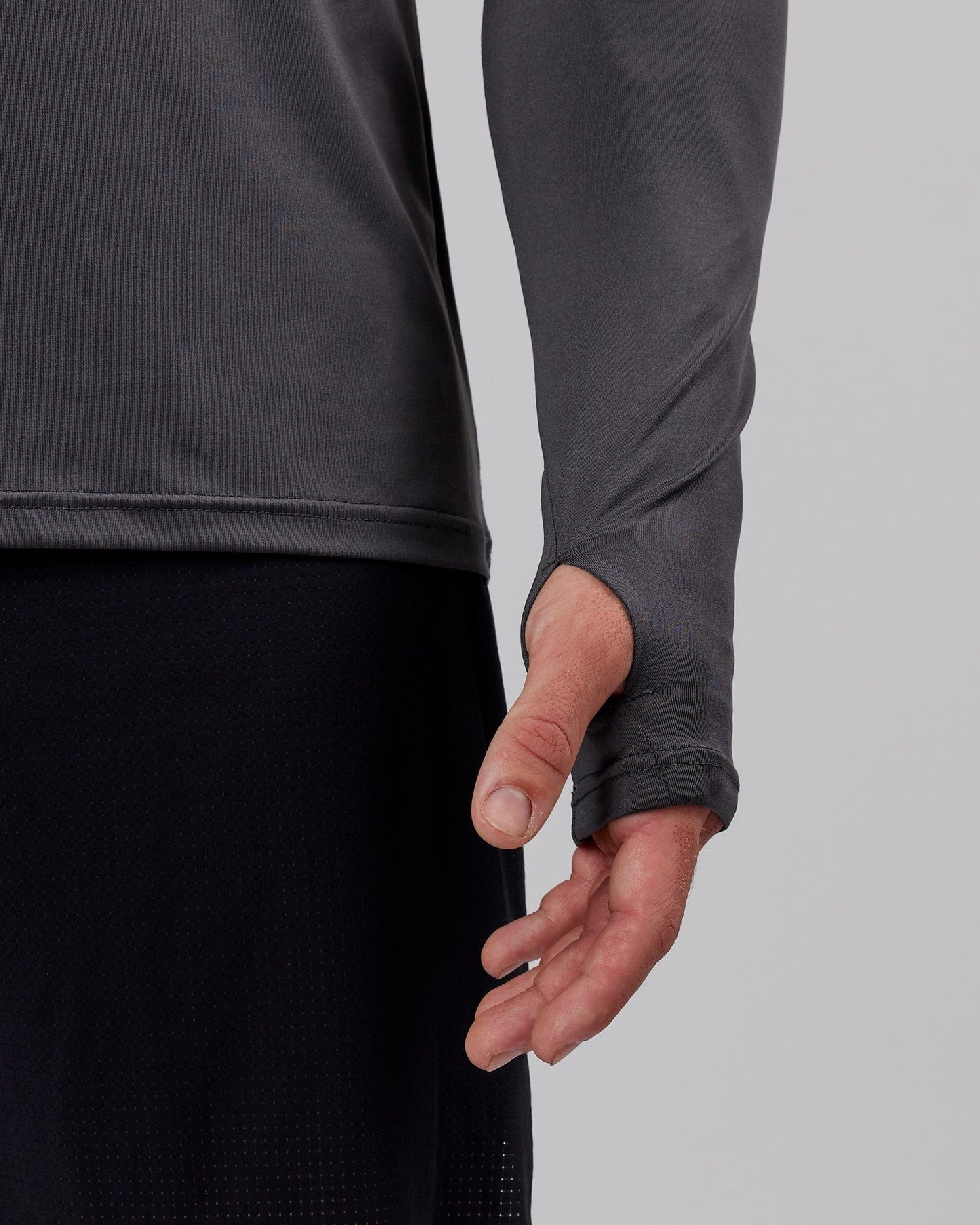 Model wearing Streamlined 1/4 Zip Active LS Top - Asphalt