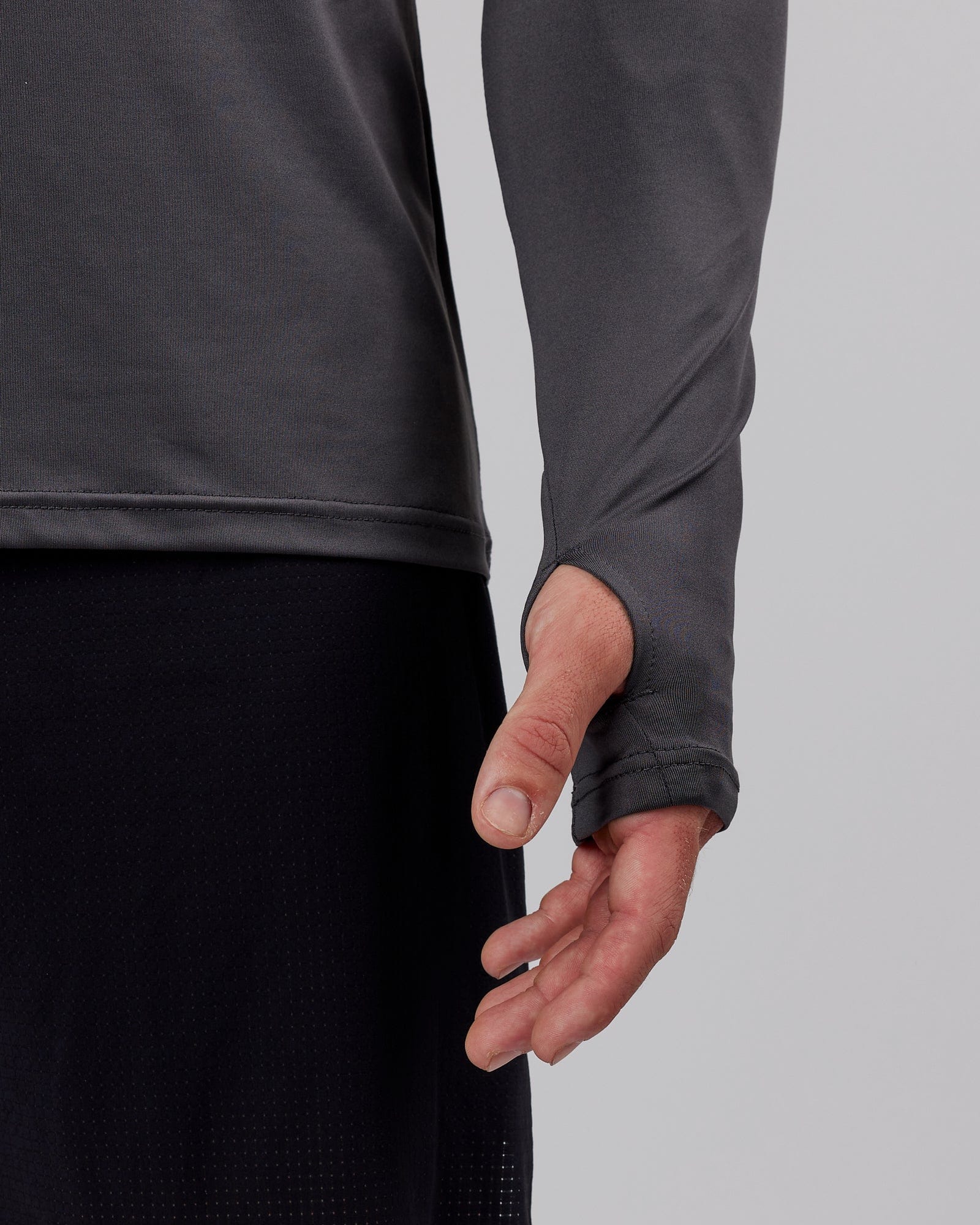 Model wearing Streamlined 1/4 Zip Active LS Top - Asphalt
