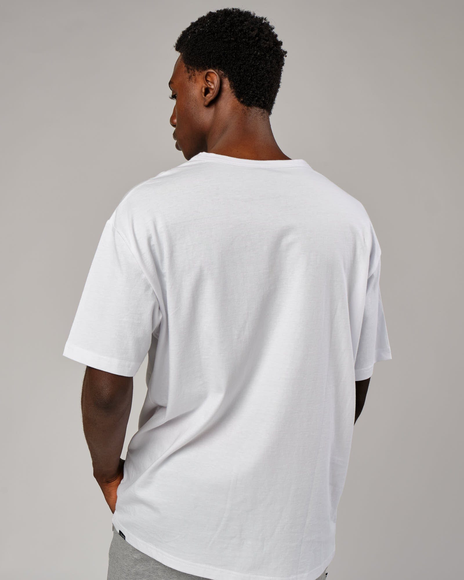 Model wearing Taylor Tee Oversize - White