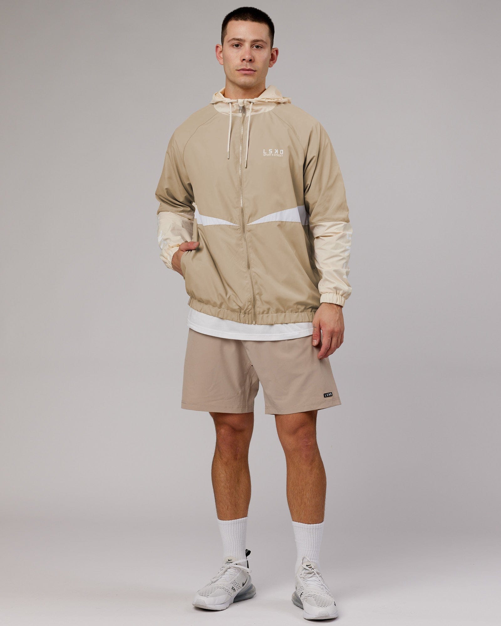 Model wearing Trackside Jacket - Light Fawn