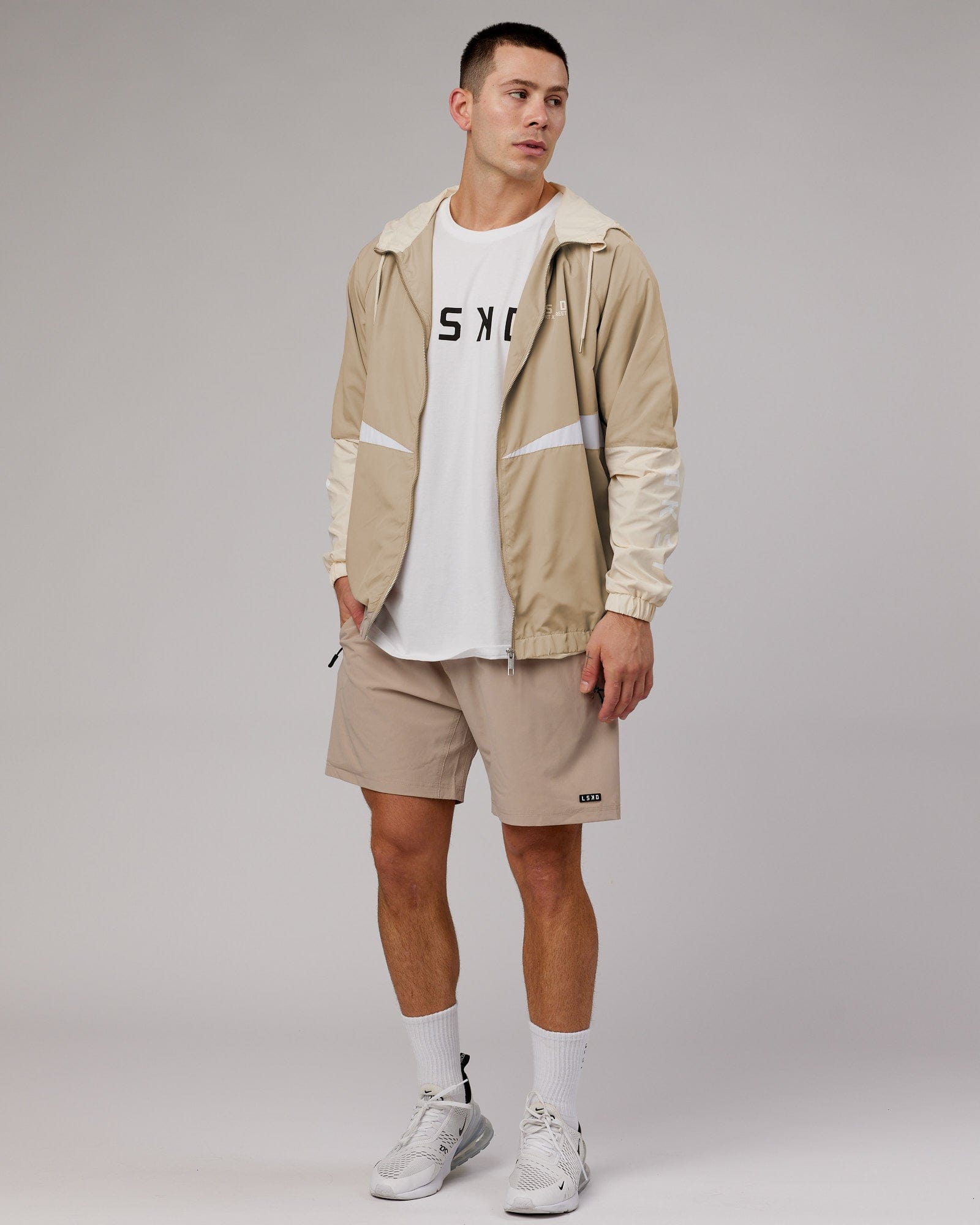 Model wearing Trackside Jacket - Light Fawn